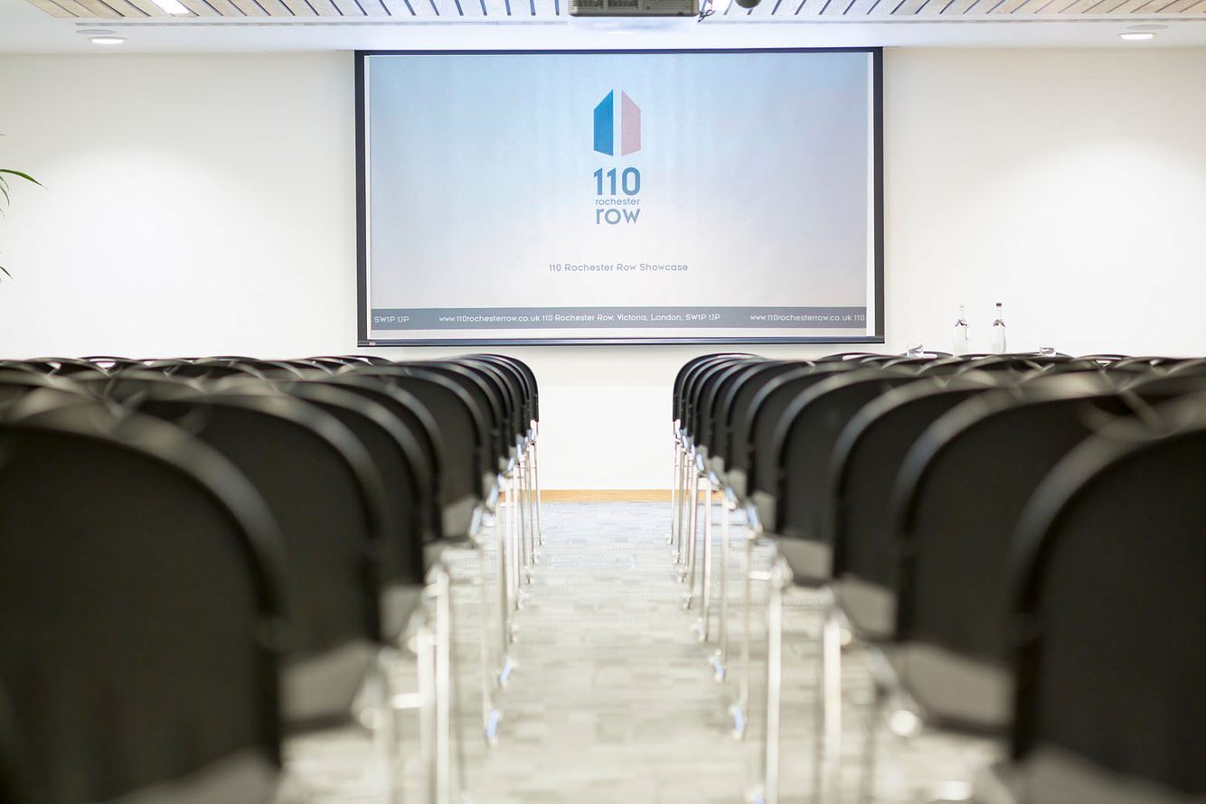 Dawson Room meeting space with black chairs, ideal for presentations and workshops.