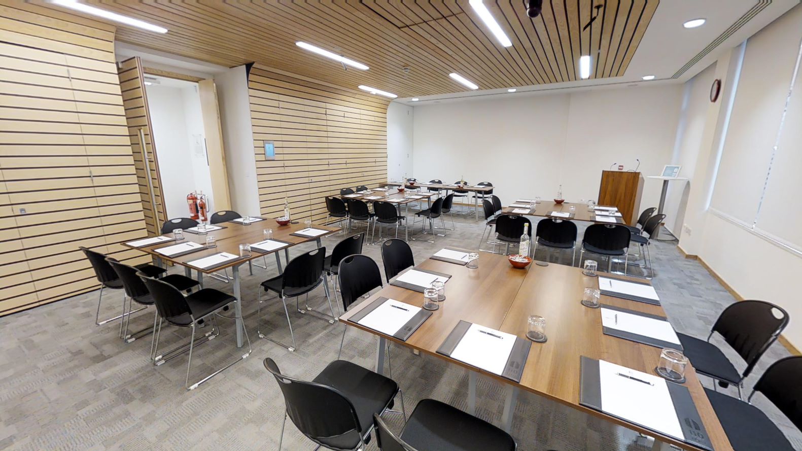 Dawson Room meeting space with collaborative layout for professional events.