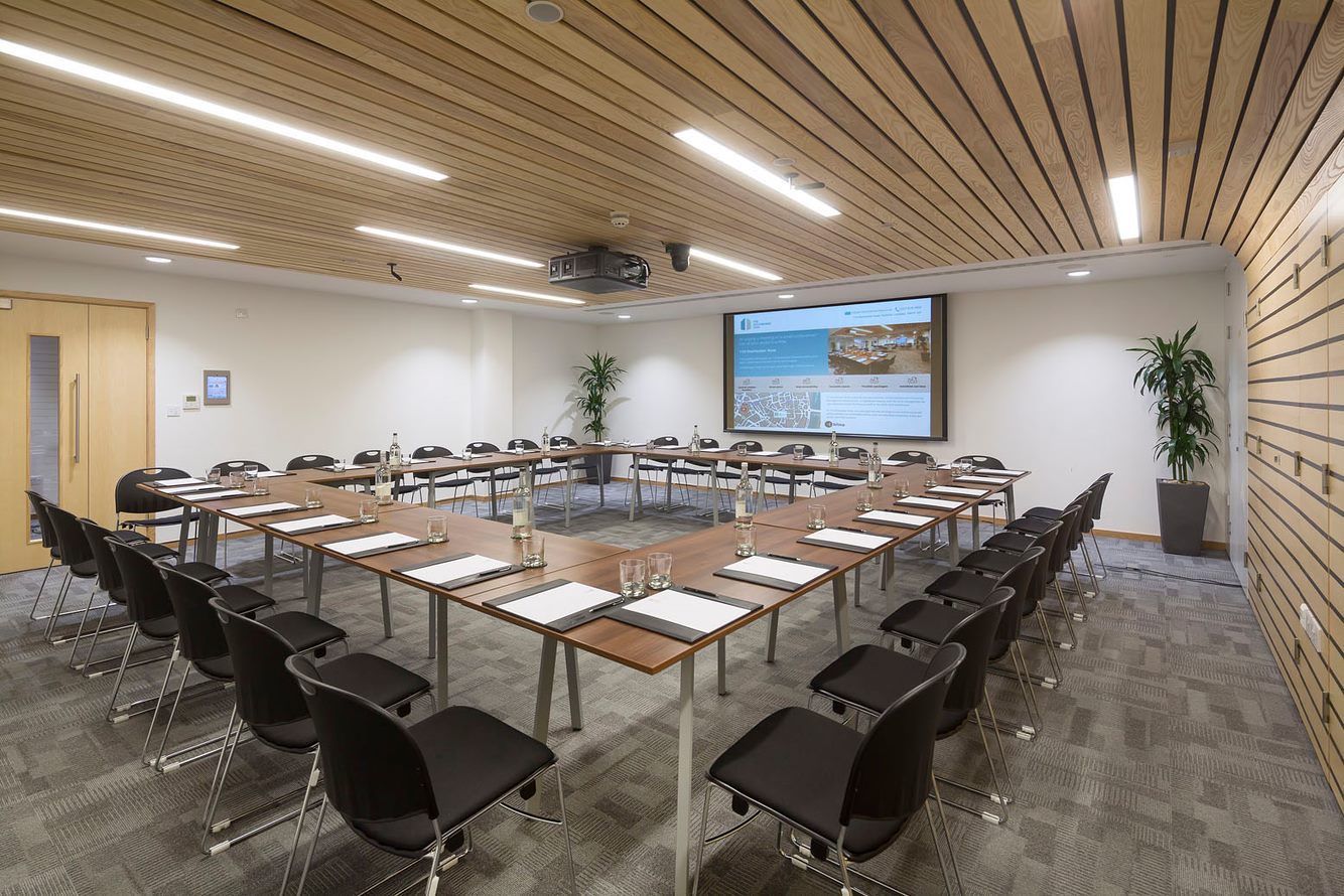 Seacole Room meeting space with U-shaped seating for productive discussions and presentations.