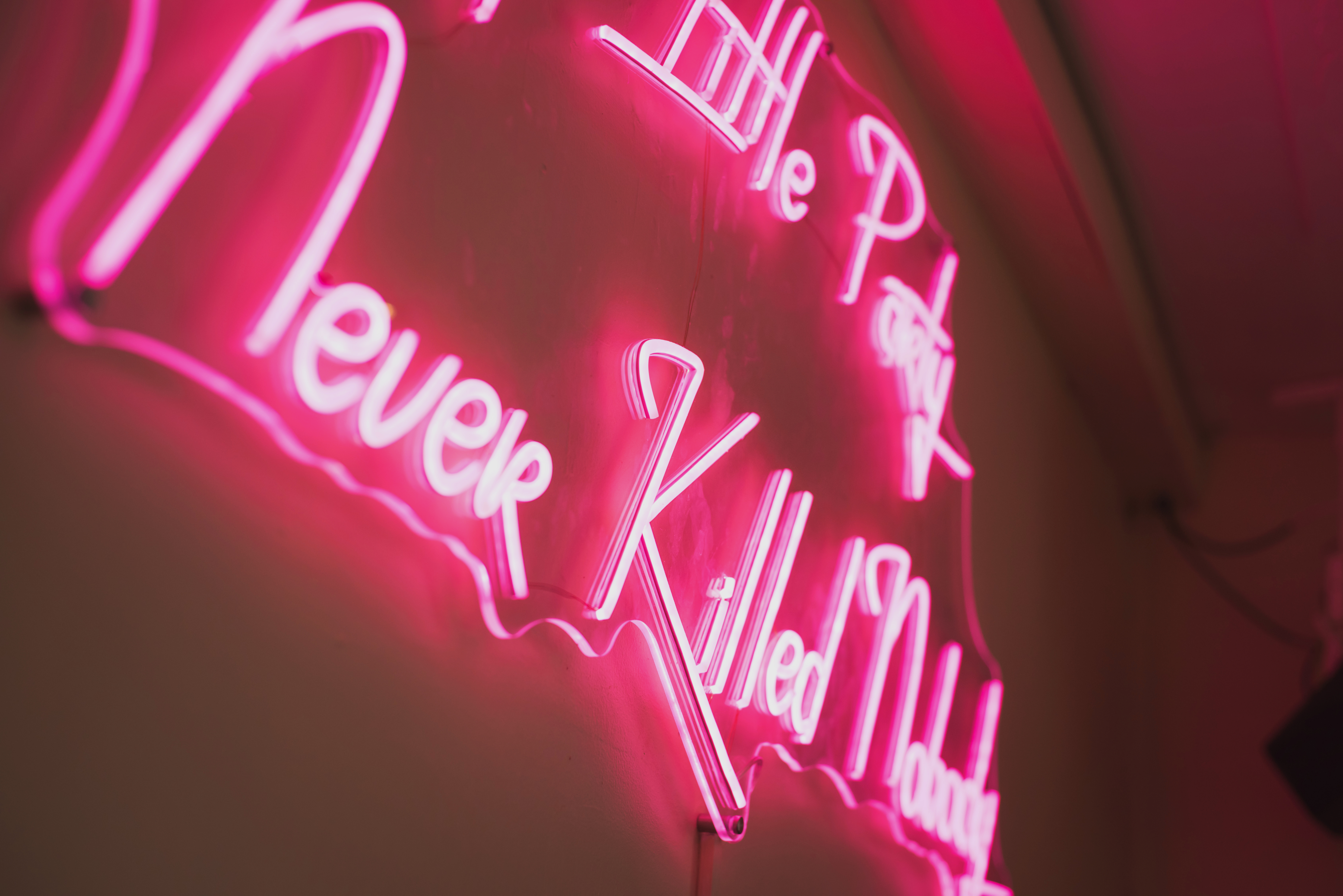 Vibrant neon sign at The Big Chill terrace for lively social events and networking.