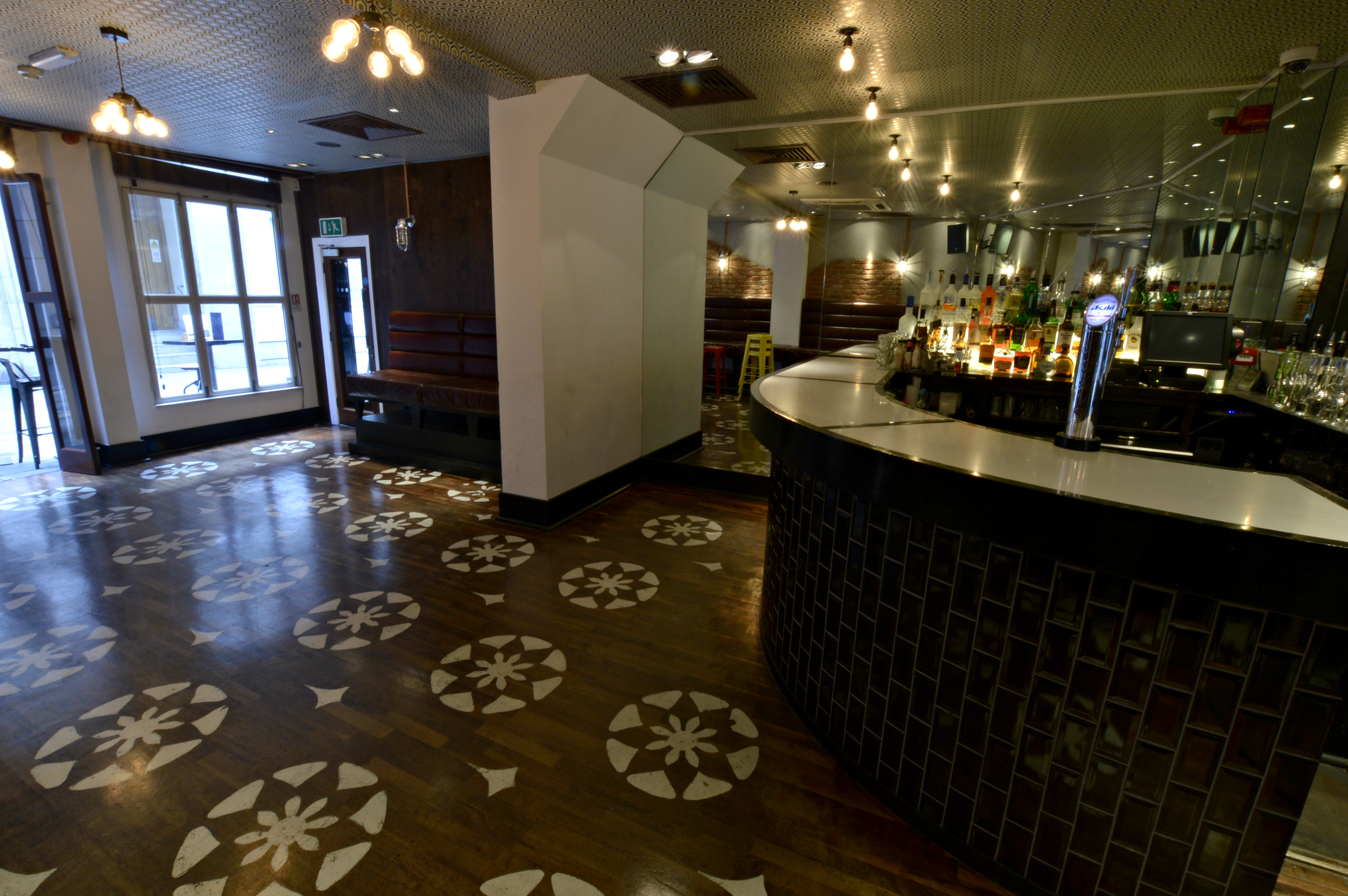 Stylish private room with modern bar for networking events at Patch St Paul’s.