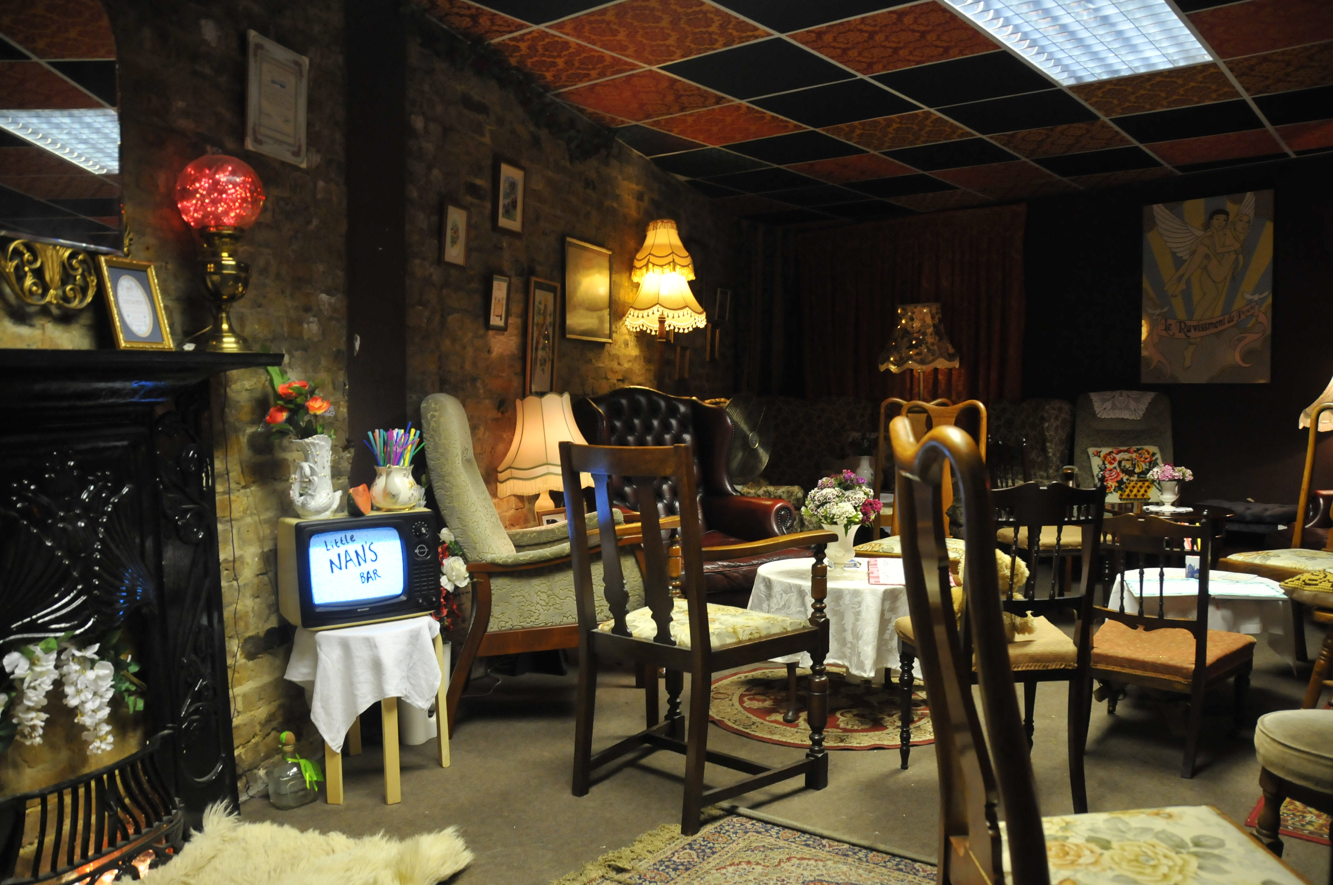 Eclectic vintage lounge at Little Nan's Bar for creative brainstorming and unique networking events.