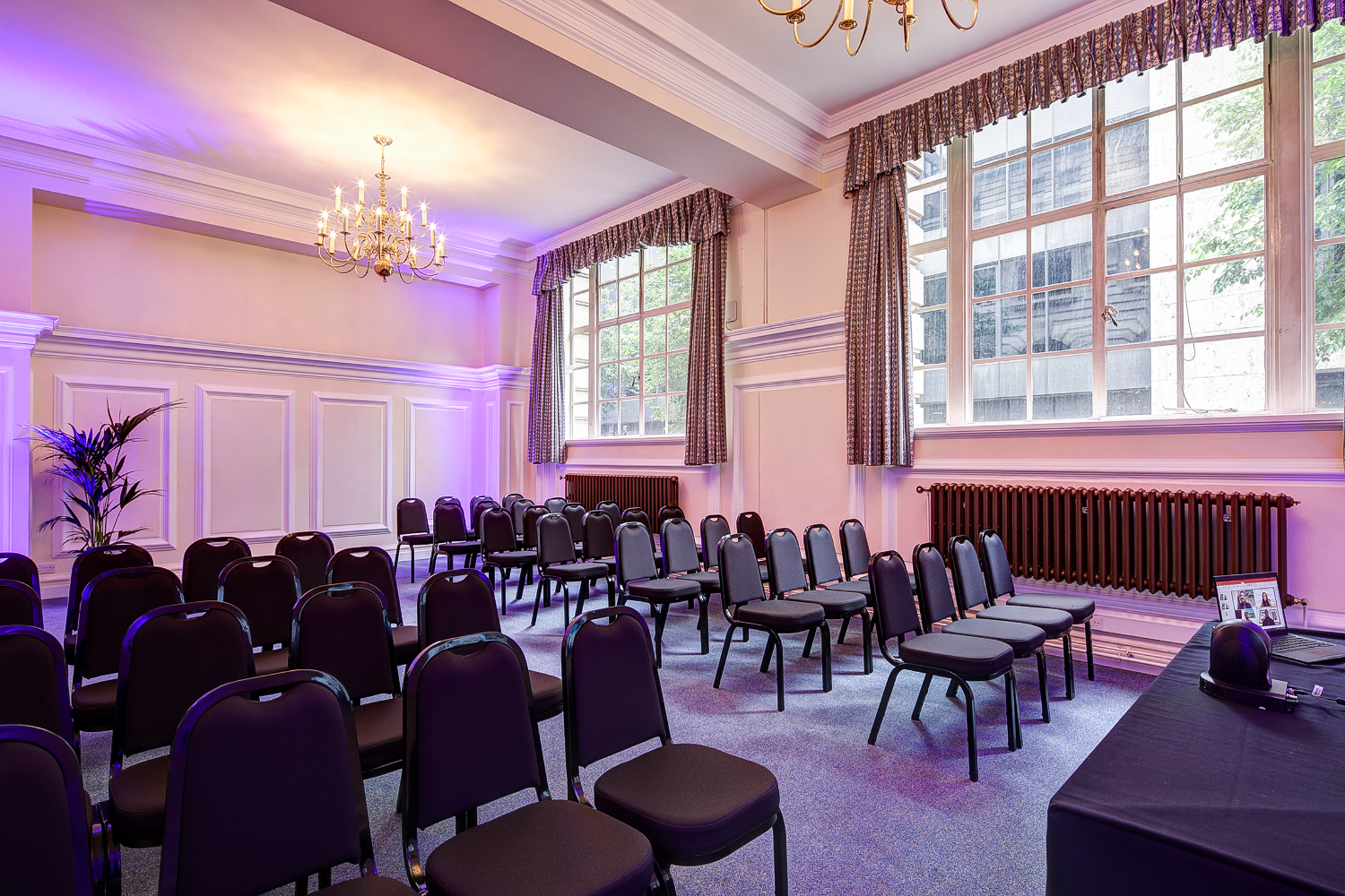 Dinsdale Young in a well-lit Central Hall Westminster meeting room for events.