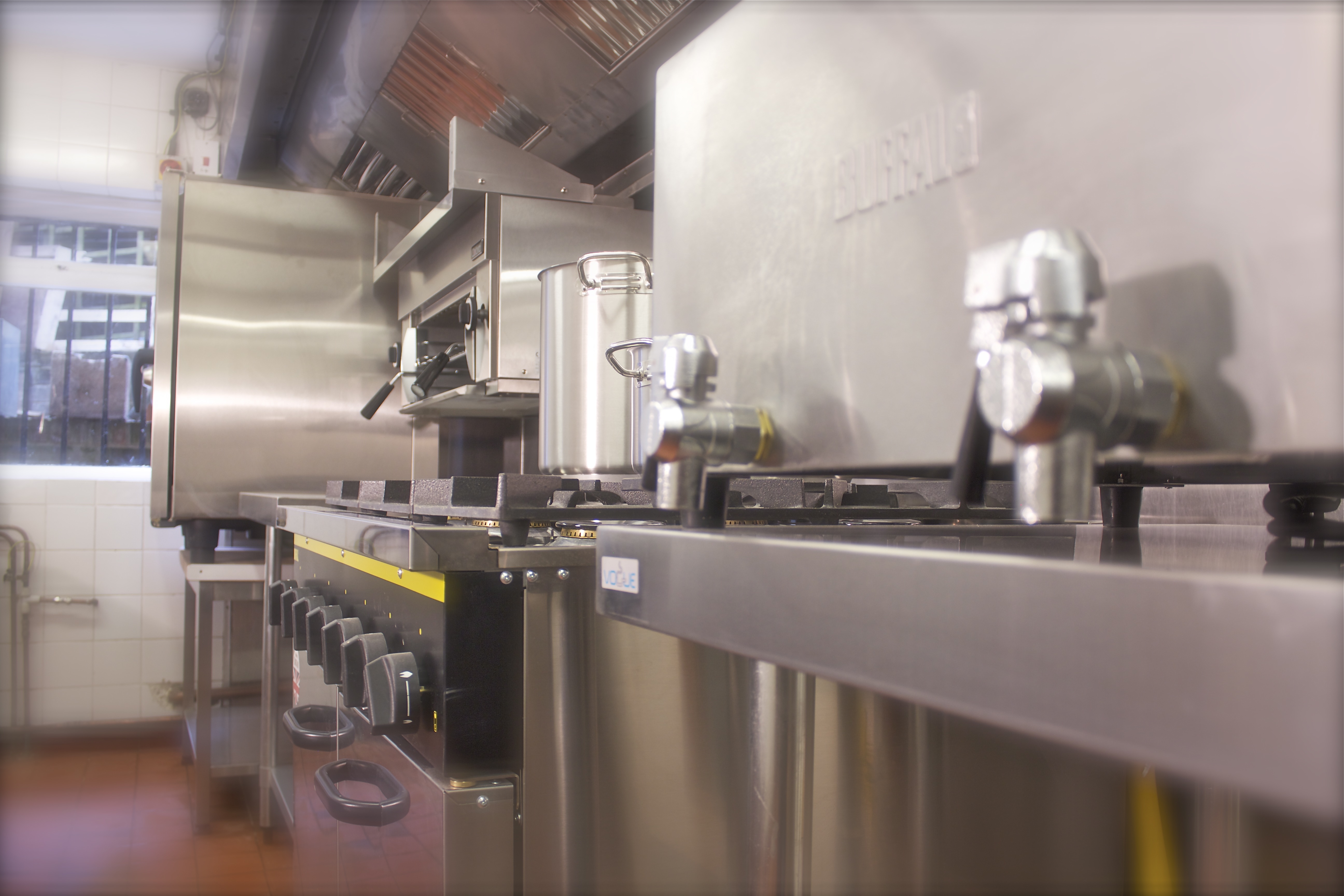 Professional kitchen in Maida Hill Place, featuring industrial appliances for events.