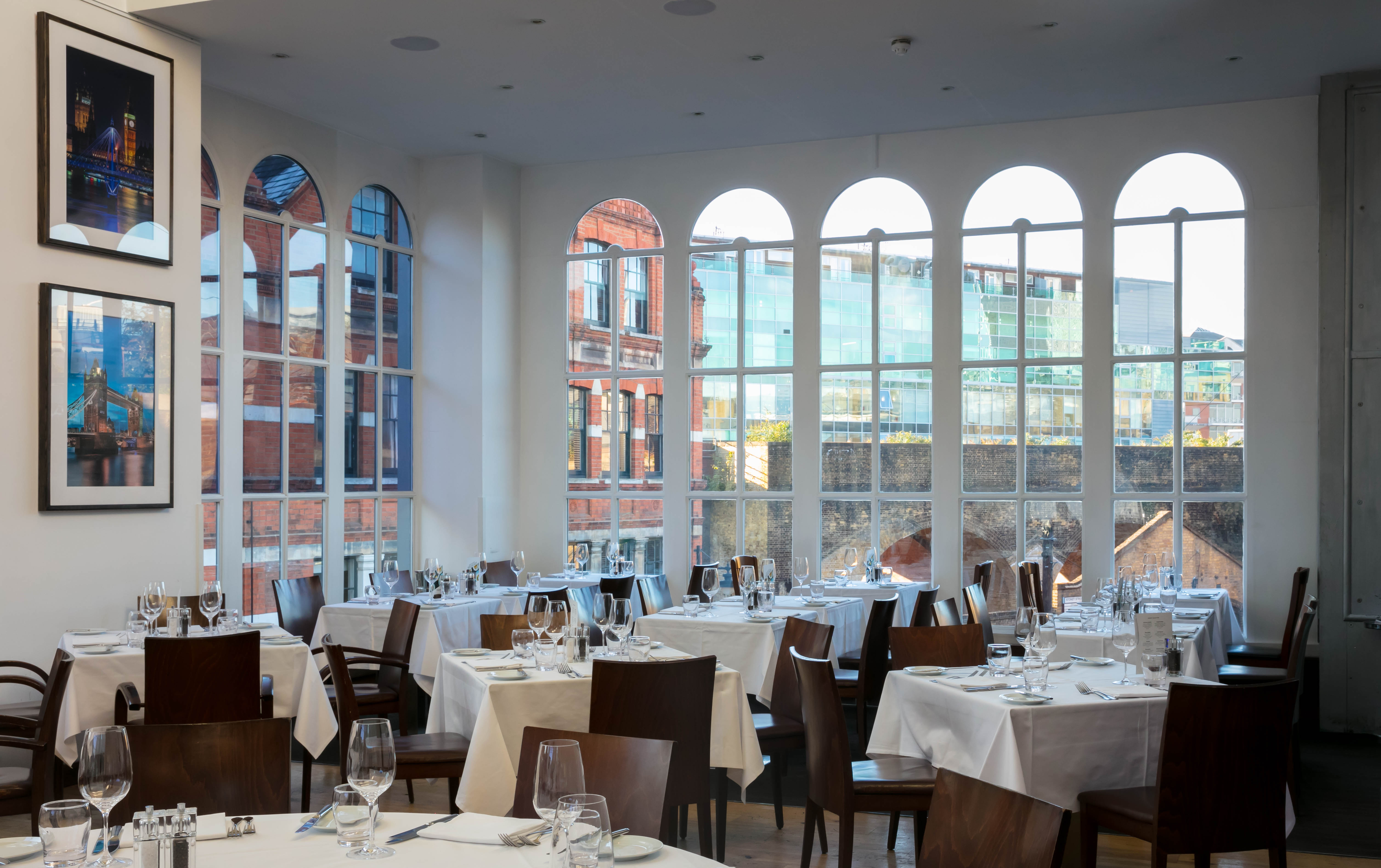 Elegant Roast Restaurant venue with white tablecloths, perfect for corporate events.