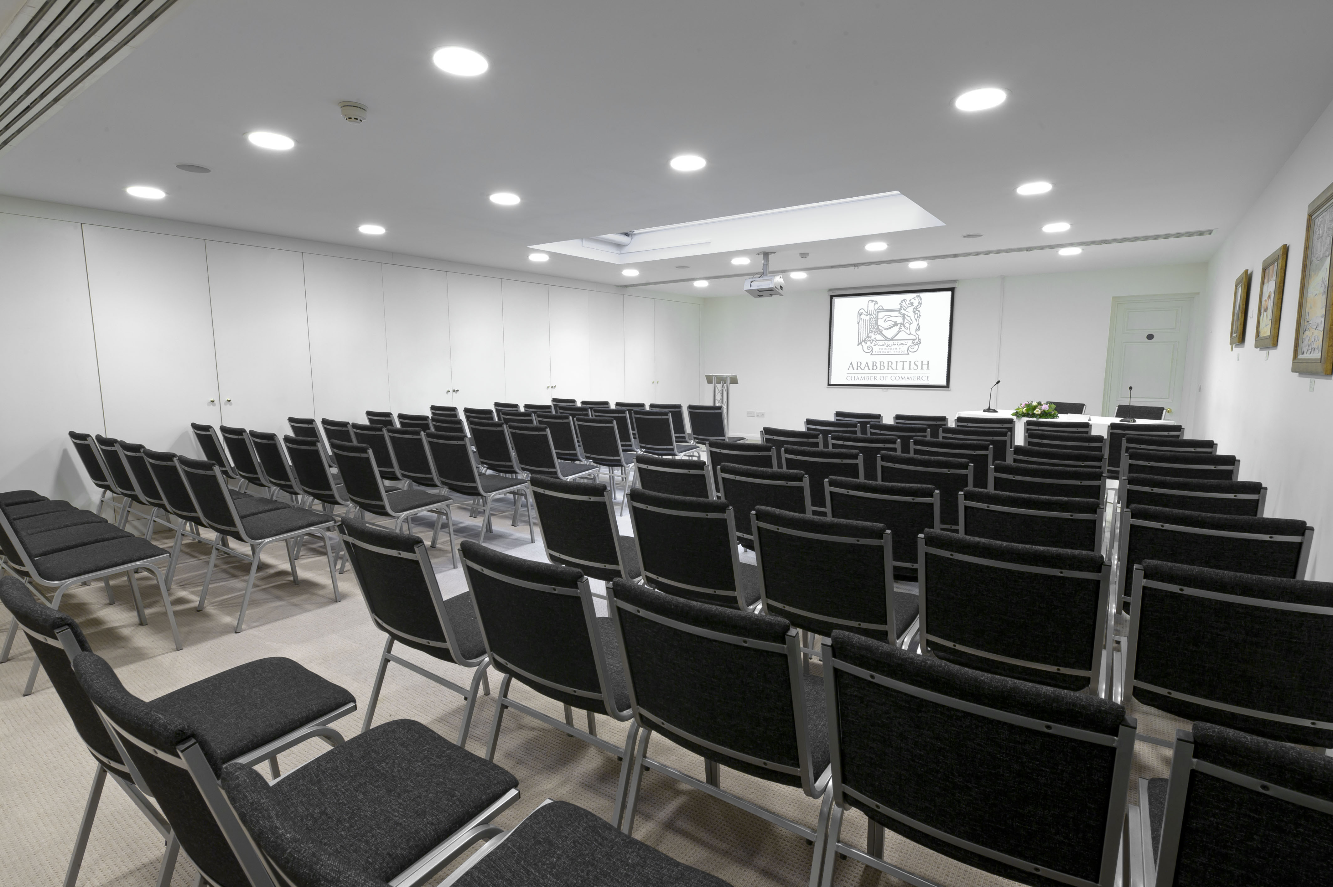 Ivory Suite meeting room with black chairs, ideal for corporate events and workshops.