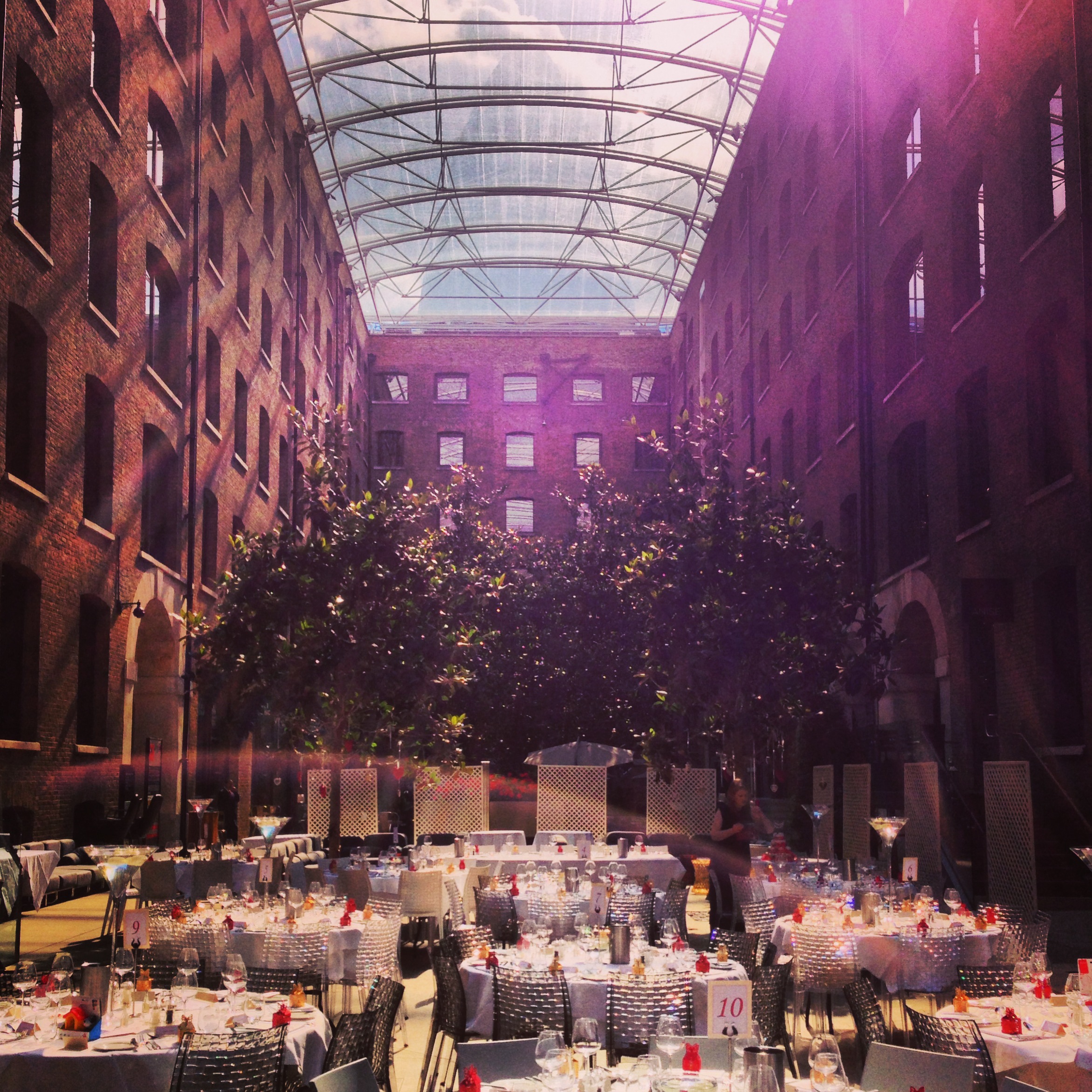 Stunning Devonshire Terrace venue with glass roof, ideal for events and gatherings.