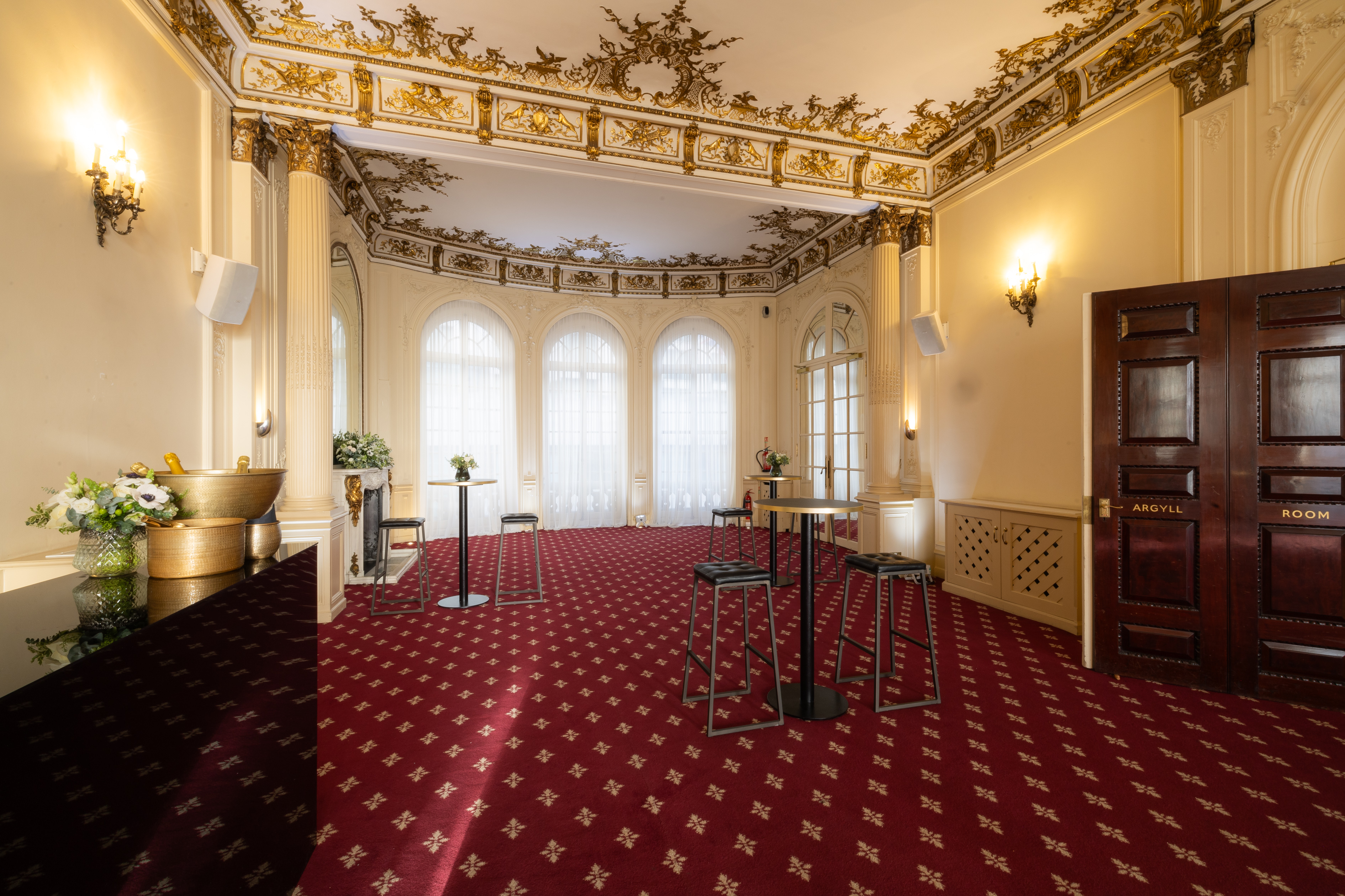 Elegant Argyll Room with plush carpet, ideal for upscale meetings and receptions.