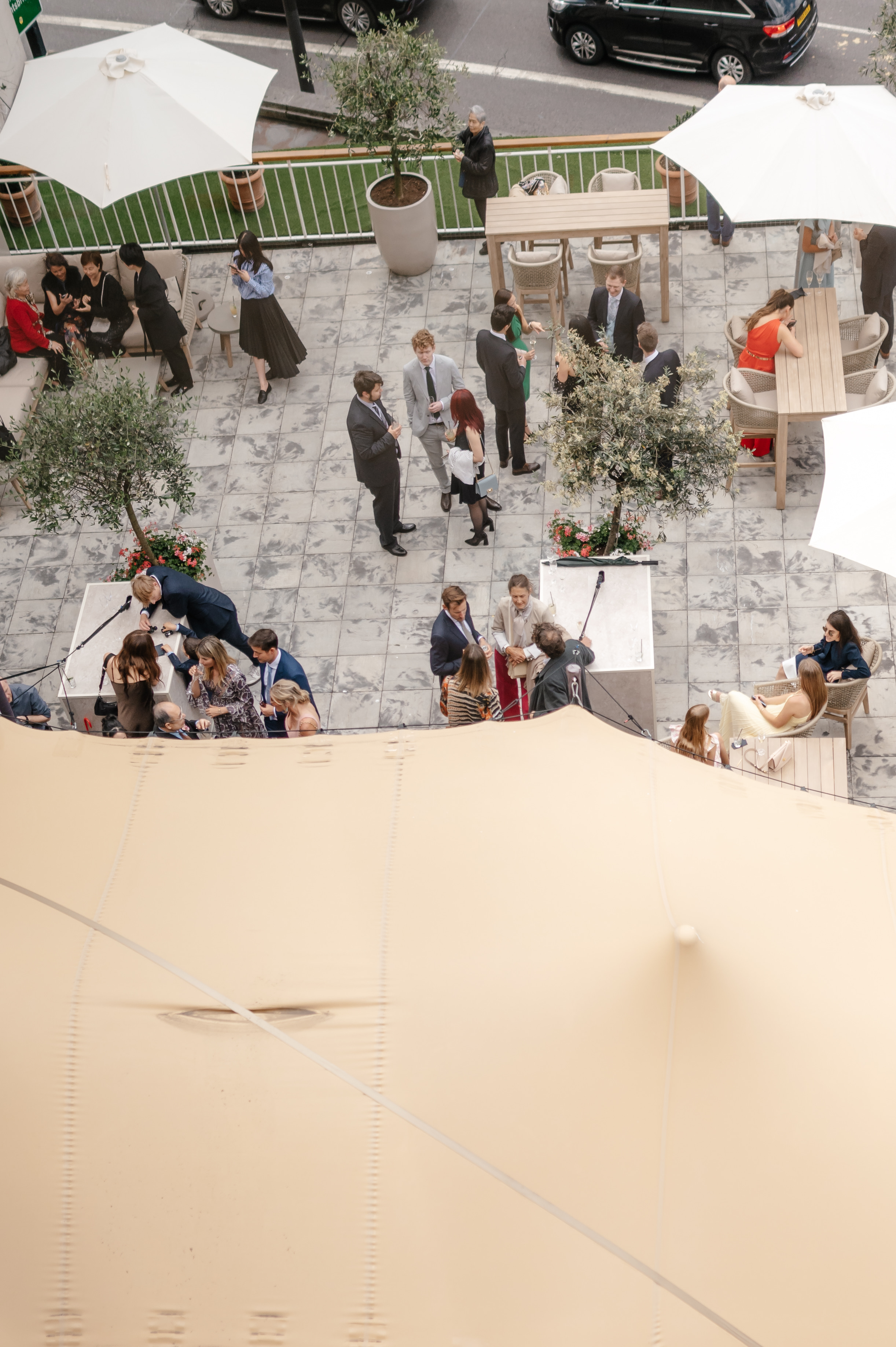 Vibrant networking event at Argyll Room with stylish tables and greenery.