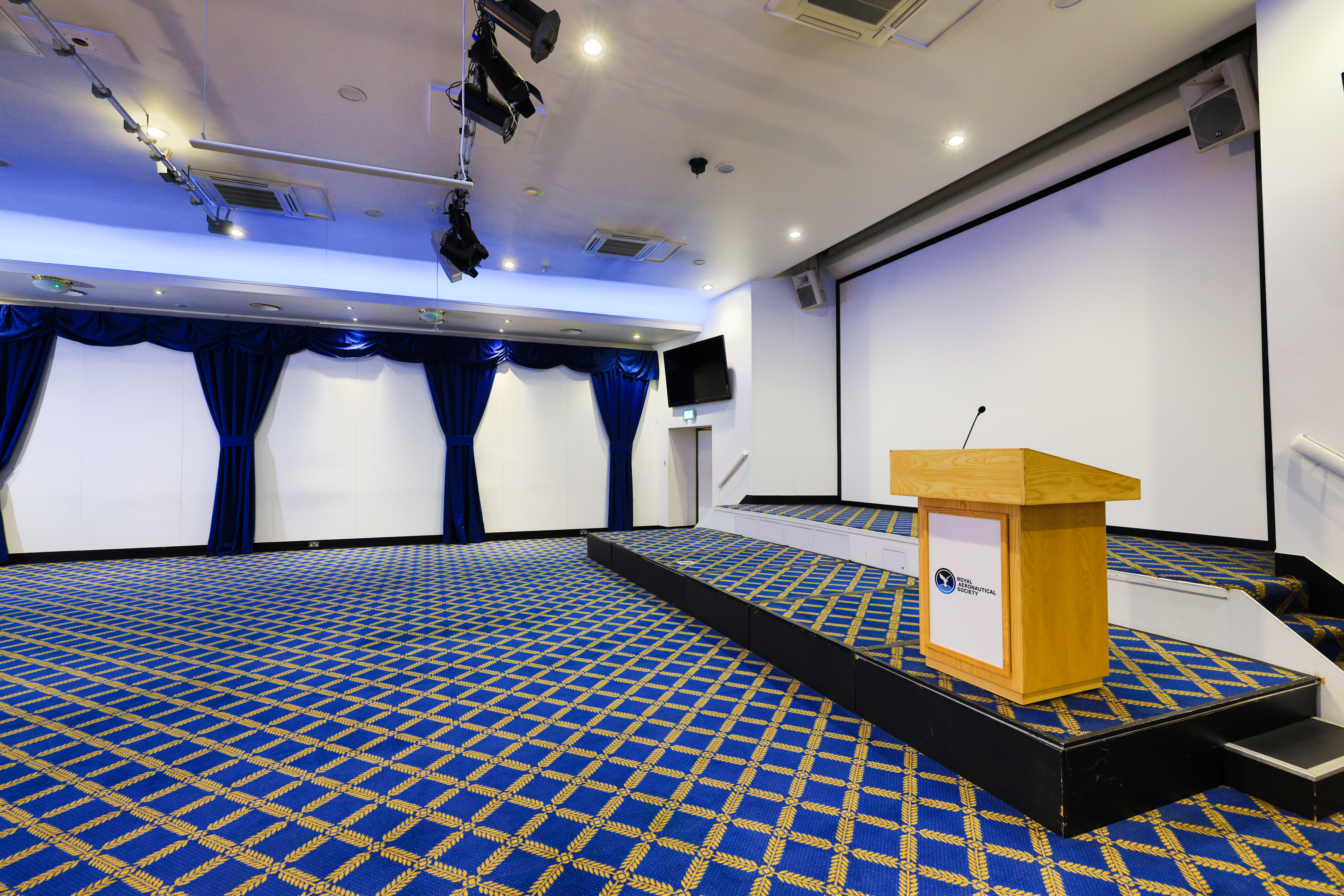 Bill Boeing Room: elegant event space with podium, ideal for presentations and workshops.