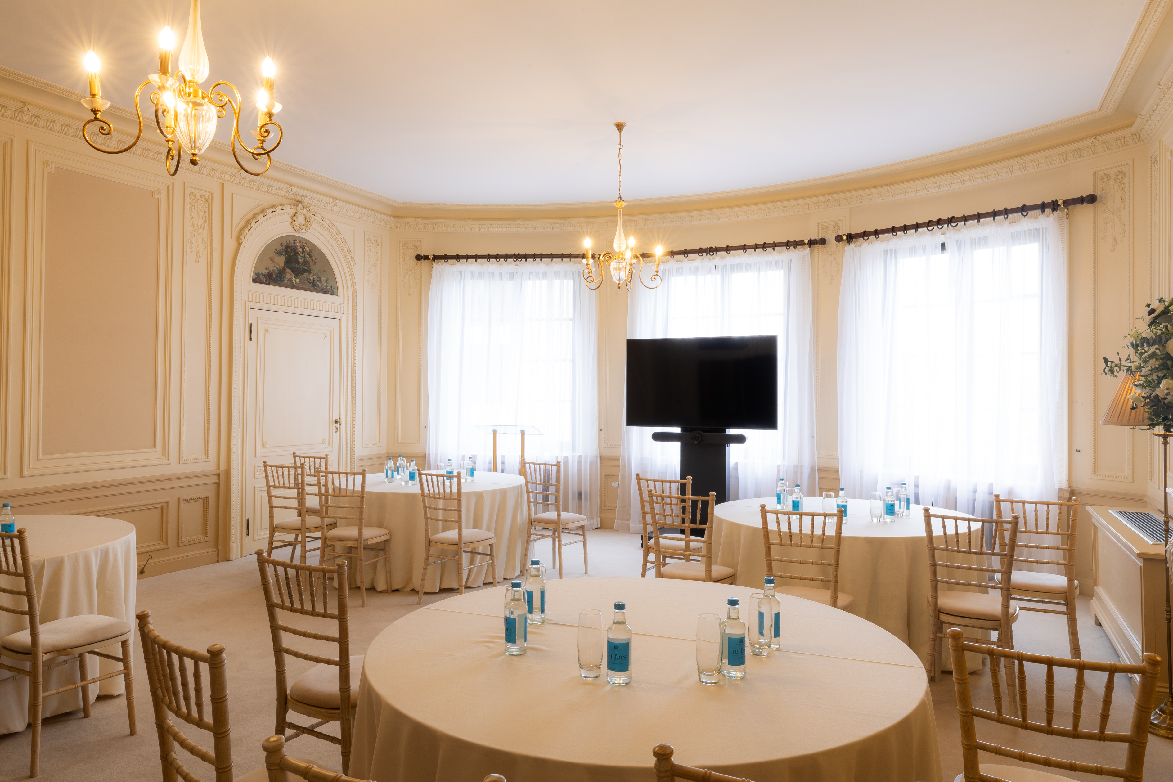 Handley Page Room: elegant meeting space with natural light for events and presentations.