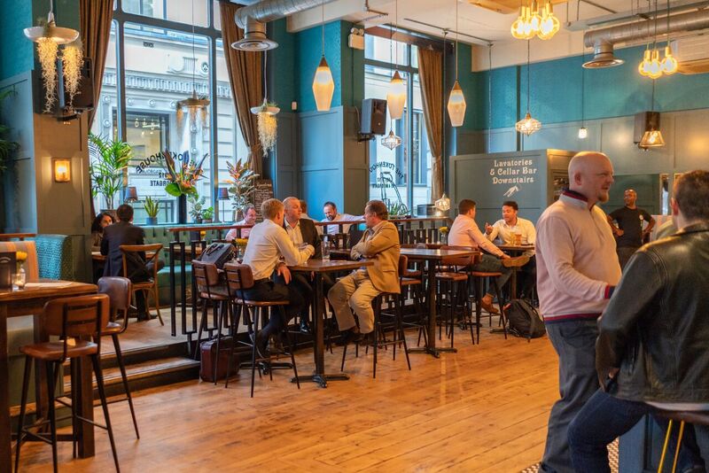 Vibrant Main Bar at The Tokenhouse, perfect for networking events and casual meetings.