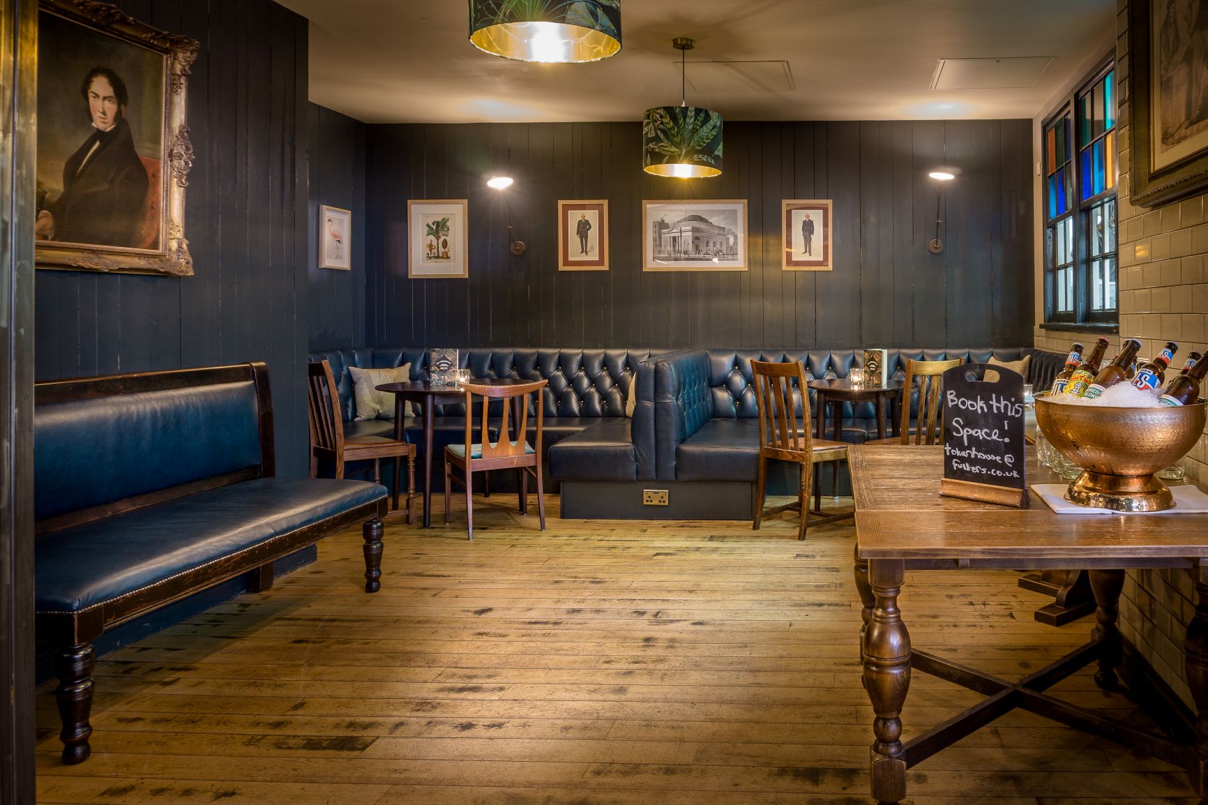 Cozy meeting space in The Tokenhouse with plush seating for intimate events.