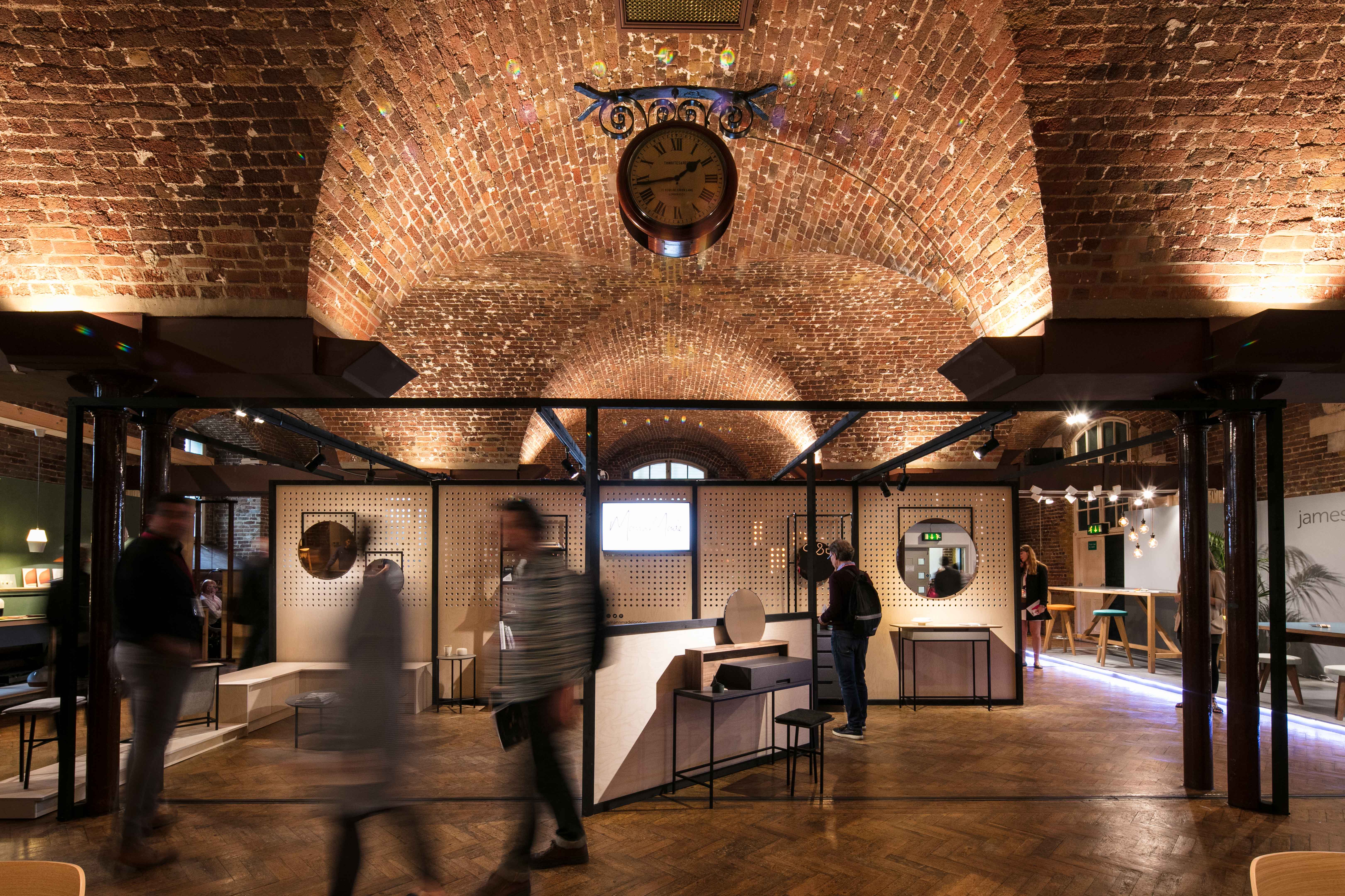 Stylish event space with exposed brick arches, ideal for networking and workshops.