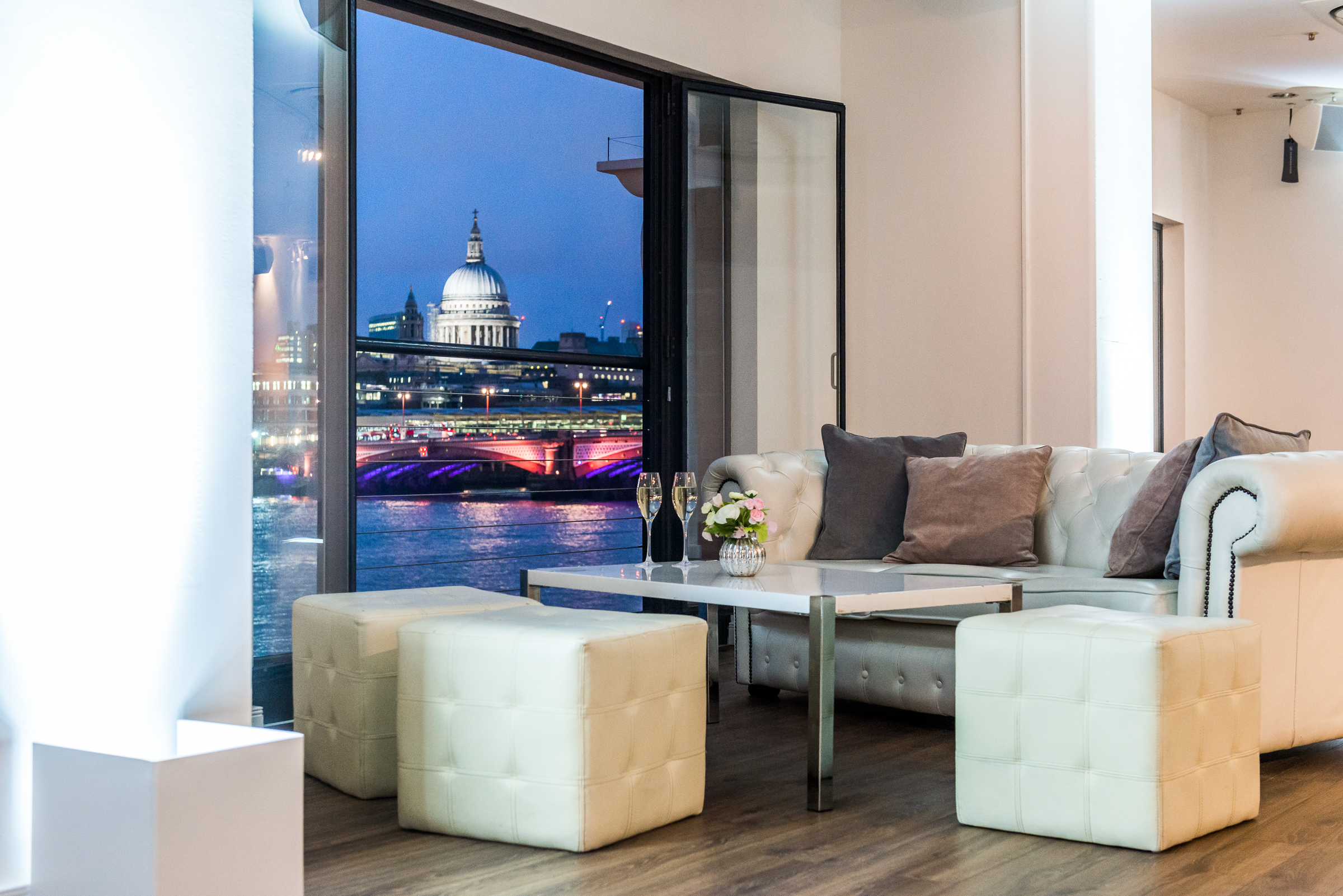 Stylish lounge at OXO2 with St. Paul's view, perfect for upscale events and gatherings.