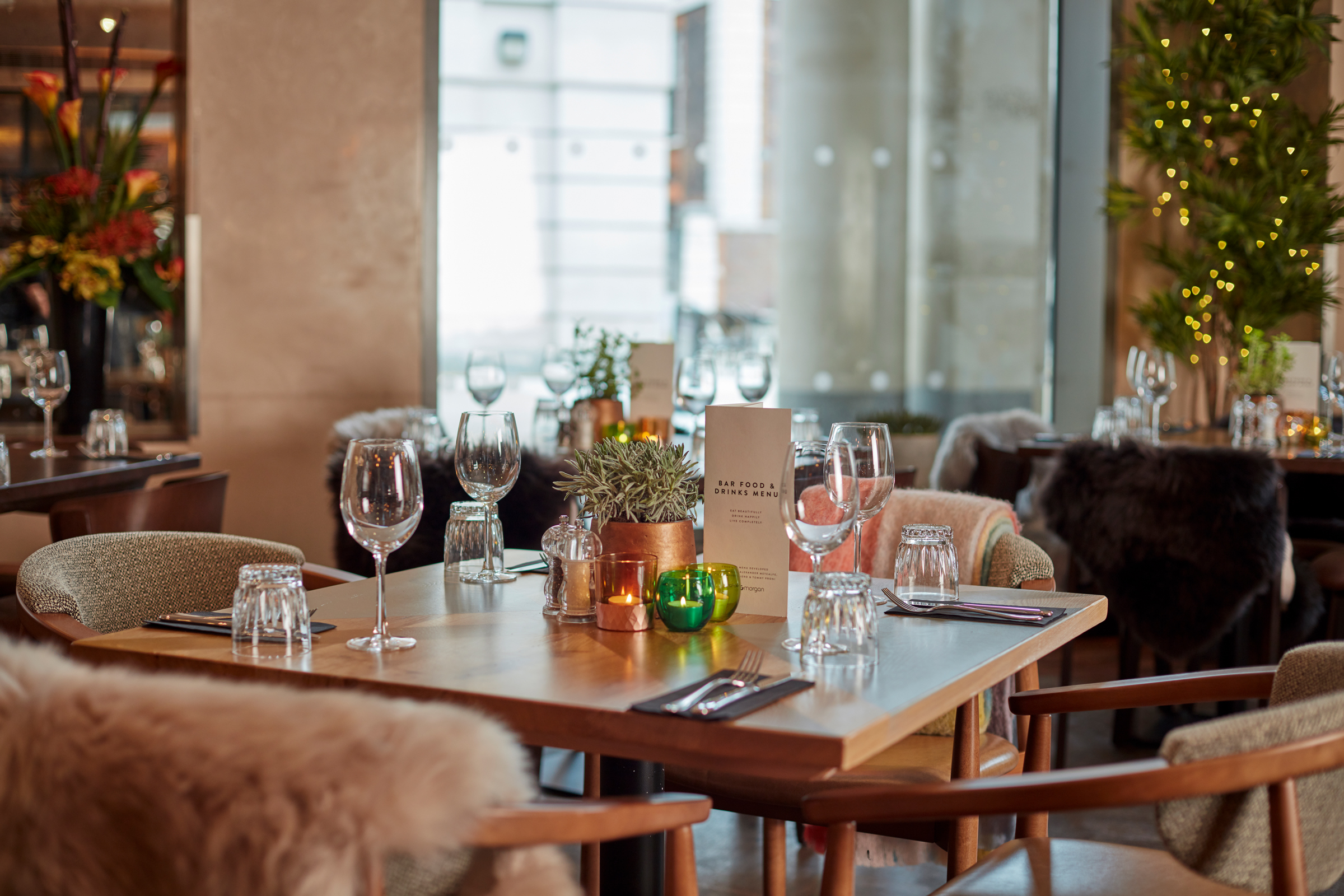 Elegant dining table in The Happenstance Lounge, perfect for intimate events and meetings.