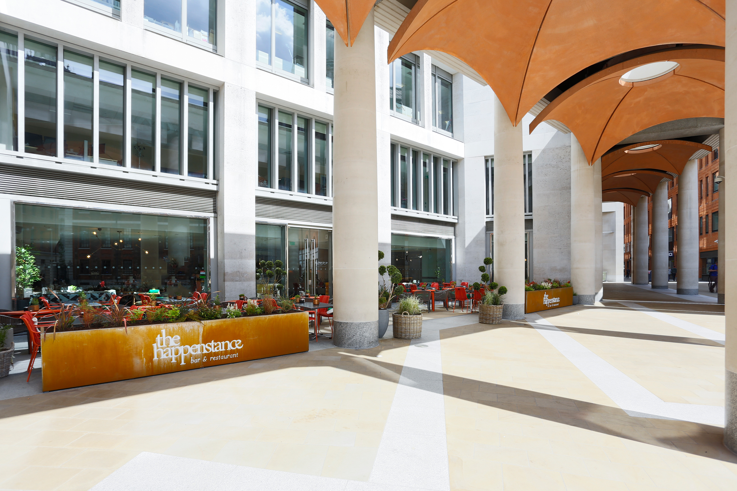 Modern open-air venue at The Happenstance, ideal for meetings and events.