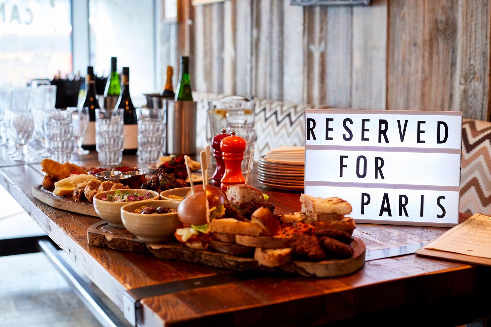 Private event table setting at The Hydrant with rustic decor and elegant glassware.