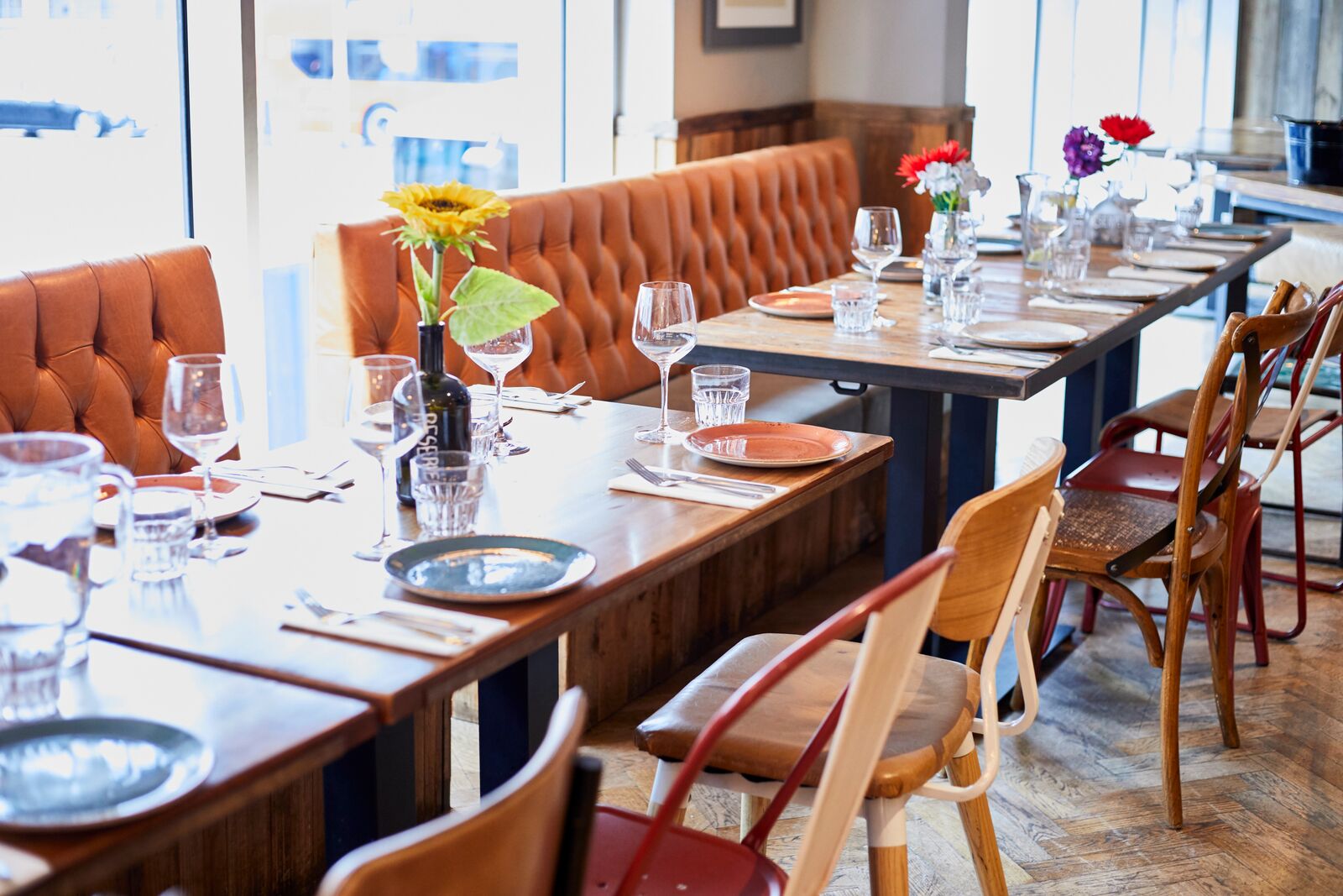 Elegant dining setup with floral centerpieces for small events at The Hydrant.