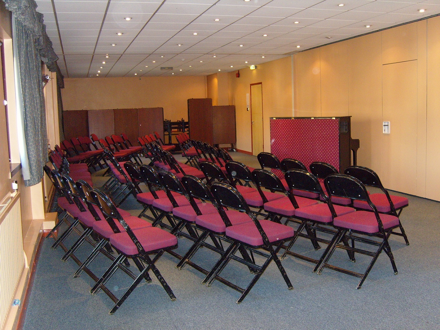 Alexander Wilding Suite meeting room with folding chairs for presentations and seminars.
