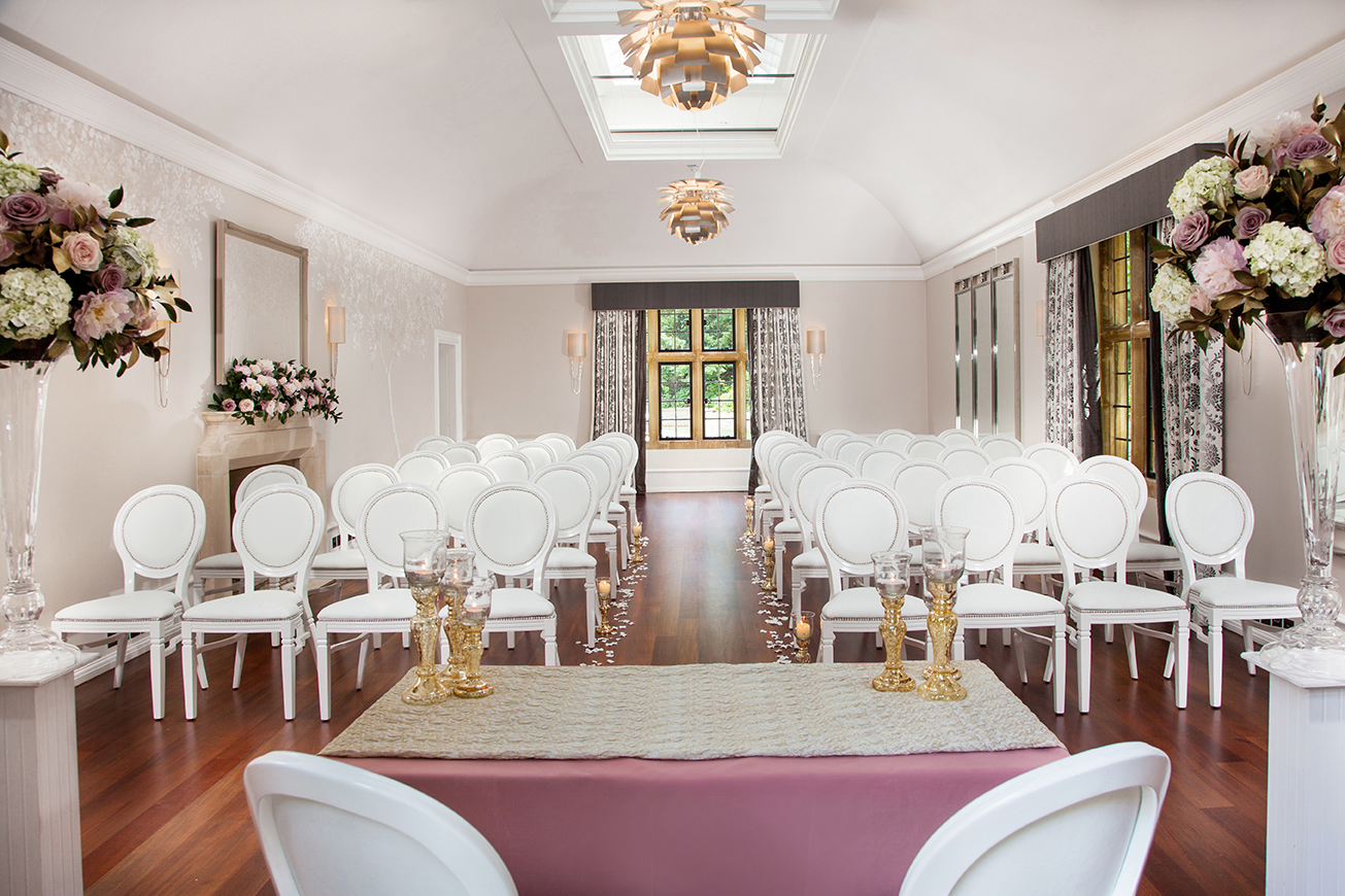 Elegant event space at Foxhill Manor with white chairs, perfect for weddings and gatherings.