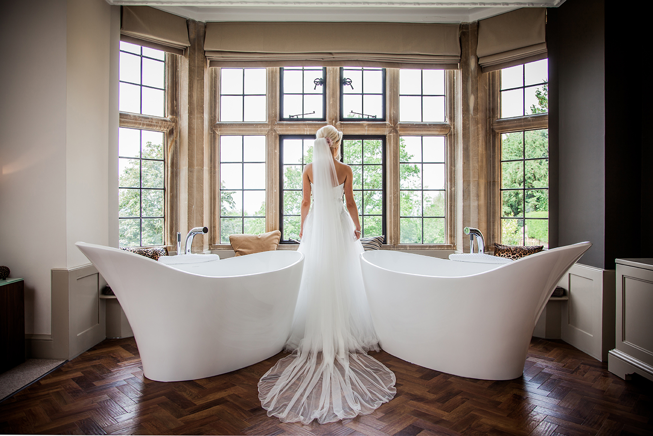 Elegant bridal suite at Foxhill Manor with freestanding bathtub, perfect for luxury weddings.