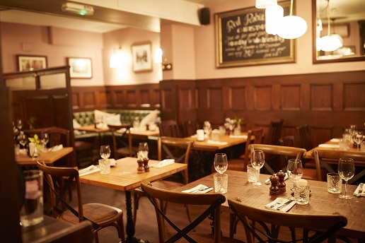 Cozy dining space in The Holly Bush for intimate gatherings and corporate events.