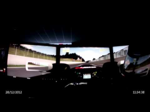 High-tech racing simulator setup for team-building events and corporate entertainment.