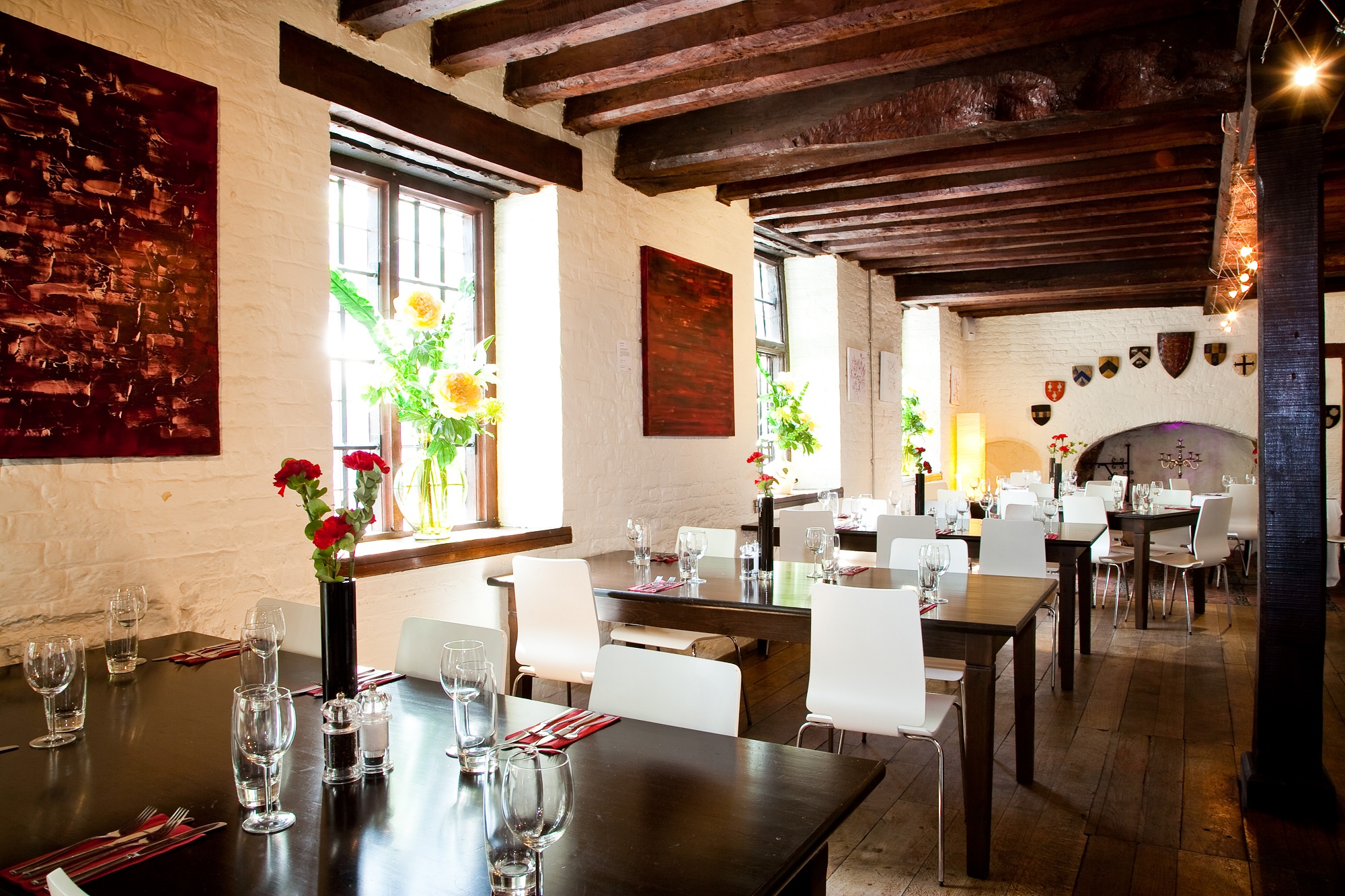 Stylish Tudor Barn Eltham dining space for corporate dinners and private events.