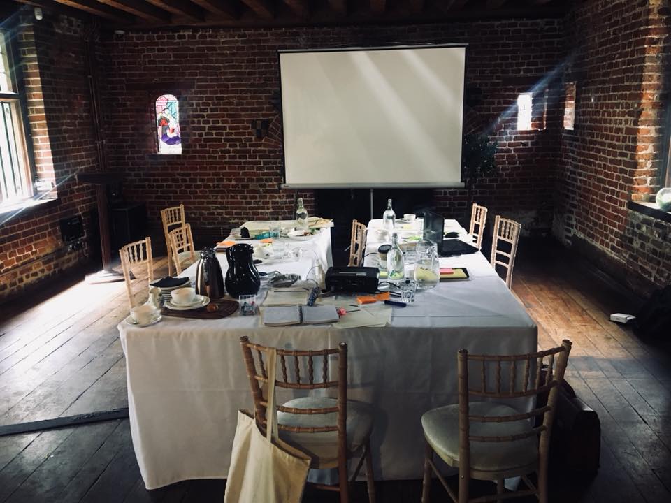 Rustic meeting space at Tudor Barn Eltham, ideal for intimate gatherings and presentations.