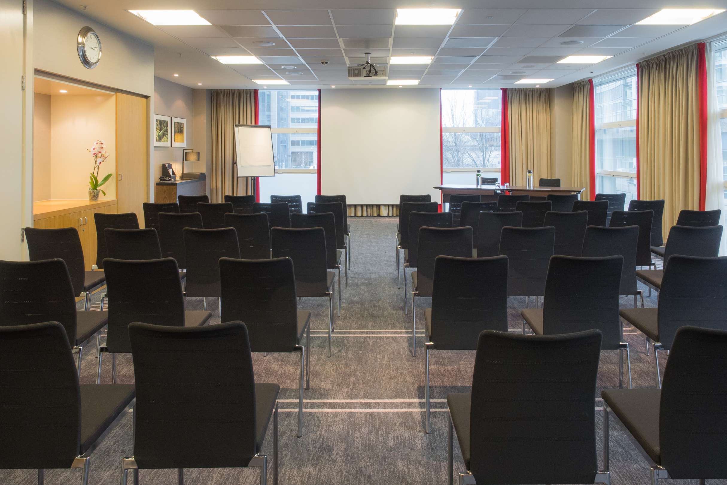 Meeting room setup with projector in Hilton London Canary Wharf for workshops and presentations.