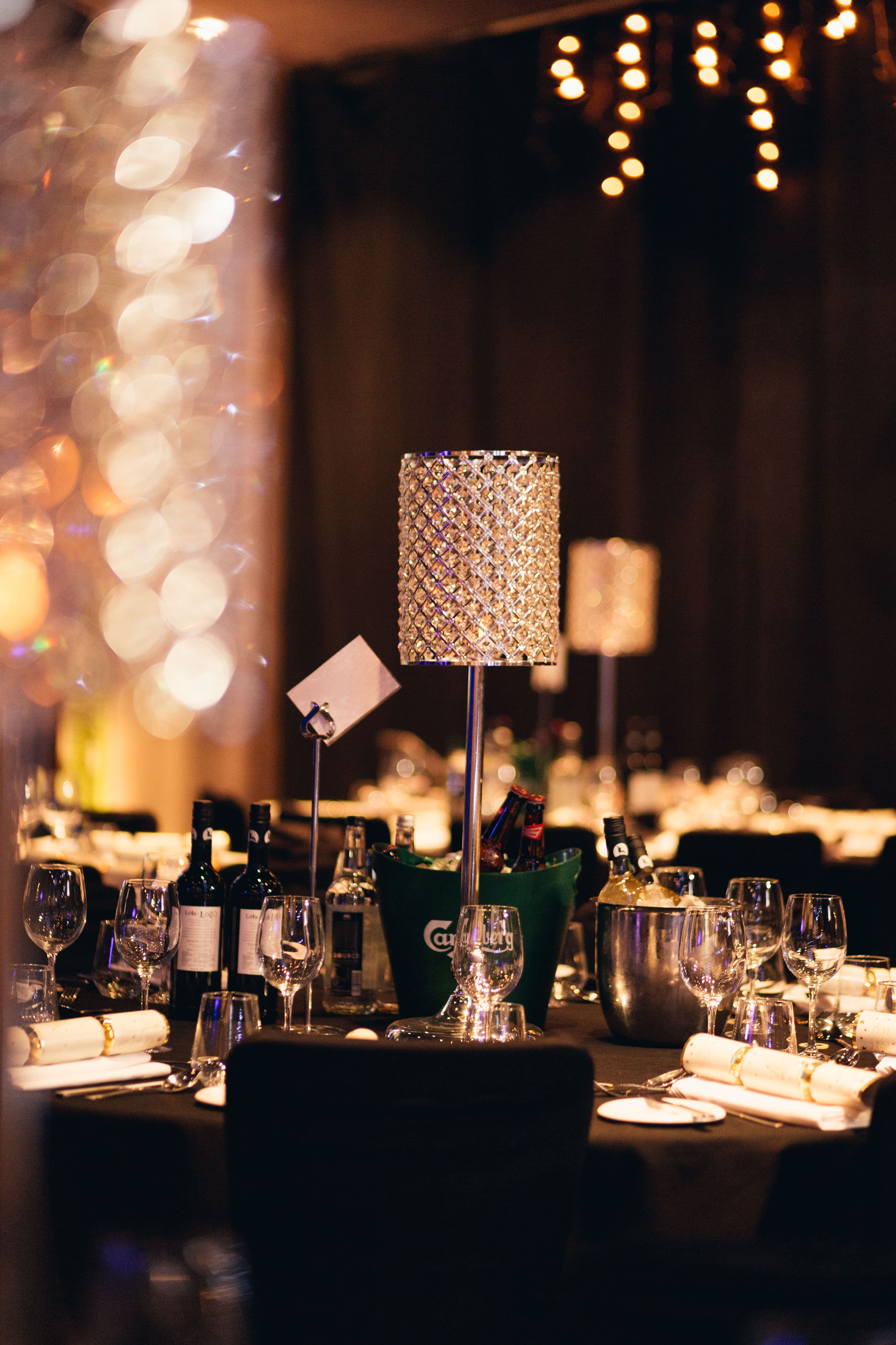 Elegant dining table with crystal centerpieces in Manchester 235 for private events.
