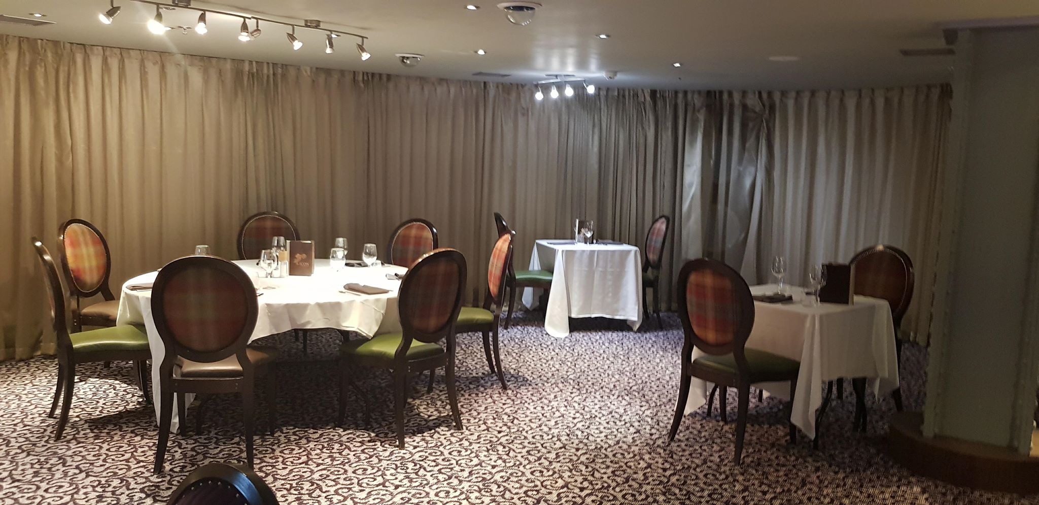 "Intimate dining space at Icon VIP Lounge, Manchester 235 for private events and meetings."