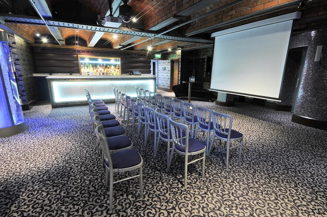 Icon VIP Lounge Manchester 235: modern event space with stylish bar for seminars and receptions.