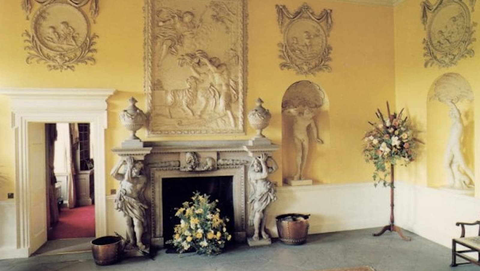Elegant White Hall at Hagley Hall with ornate decor, ideal for upscale events and receptions.