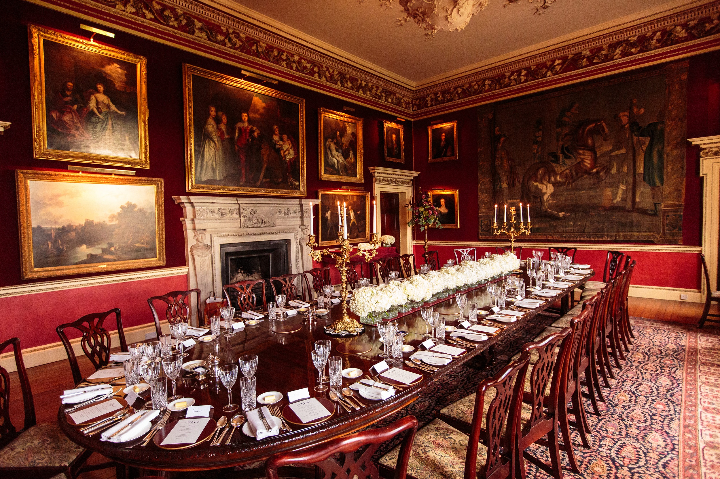 Crimson Dining Room at Hagley Hall, elegant decor for formal dinners and corporate gatherings.