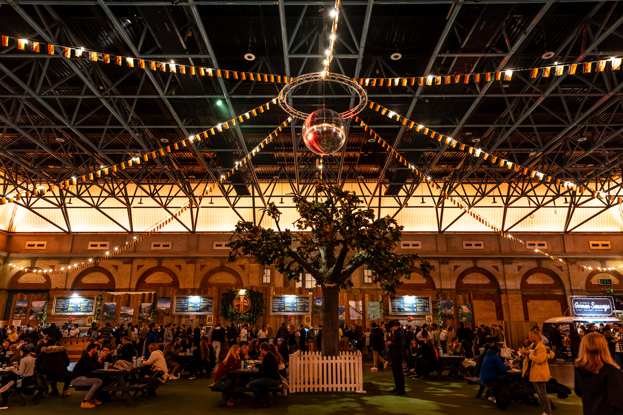 Vibrant West Hall at Alexandra Palace, ideal for networking events with lively decor.