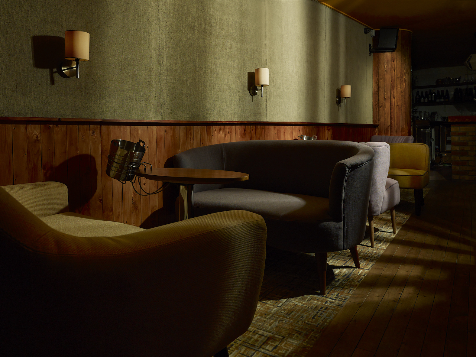 Cozy seating area in Whole Venue, ideal for small meetings and networking events.