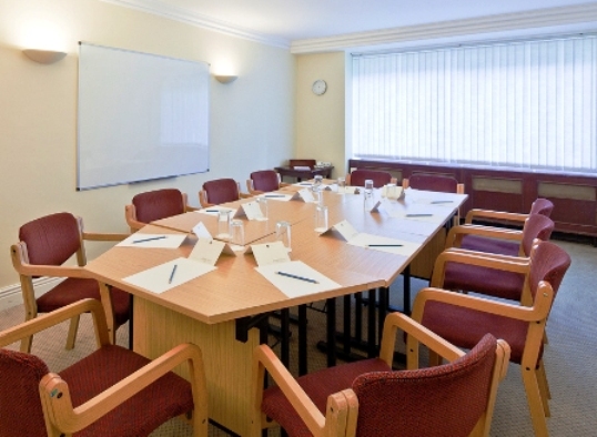 Hagley Suite meeting room with oval table, ideal for conferences and workshops.