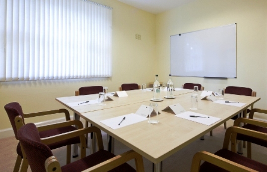 Meeting room at Best Western Plough and Harrow, ideal for professional gatherings.