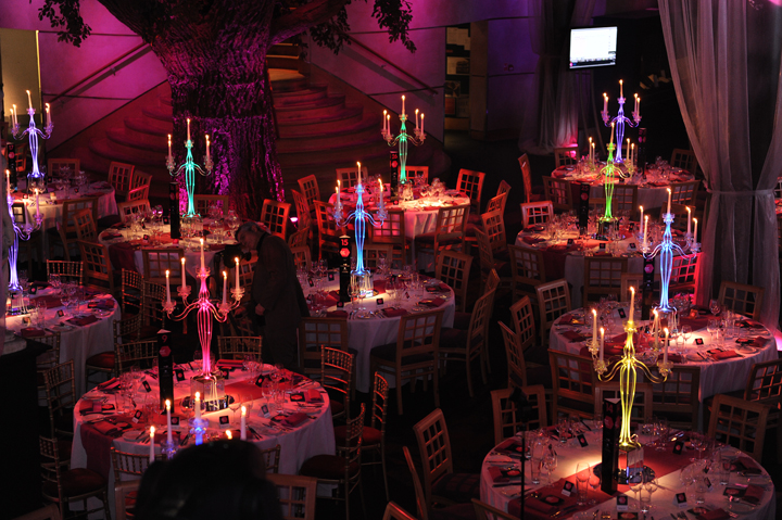 Elegant Underglobe event space with candelabras for corporate dinners and celebrations.