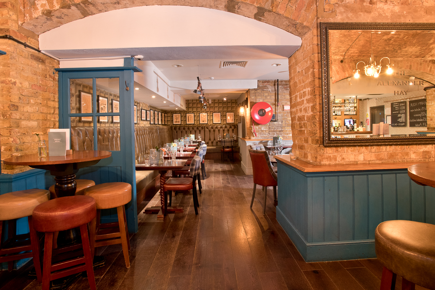 Cozy restaurant interior at The Alexander Hay, ideal for intimate meetings and networking.