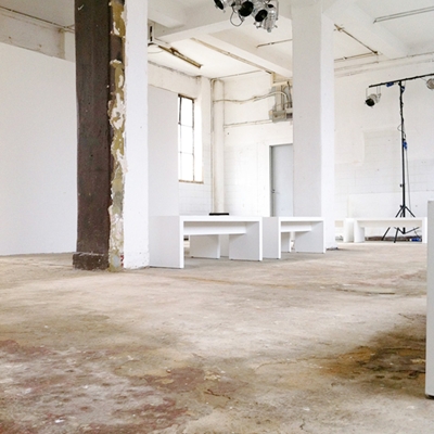 Spacious minimalist shared workspace in Maple Works for meetings and events.