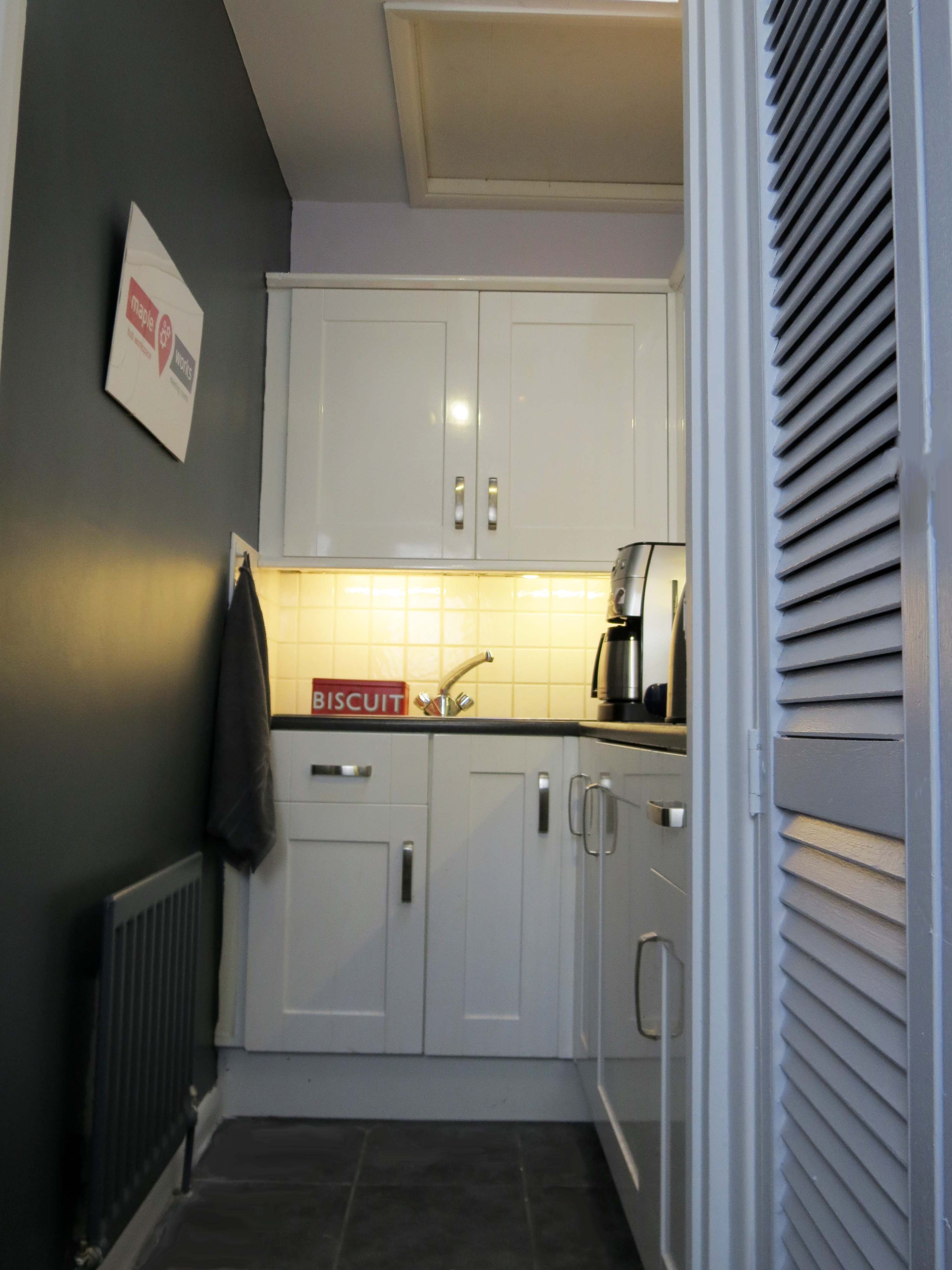 Modern kitchenette in Ash Room, Maple Works - ideal for event breaks and catering.
