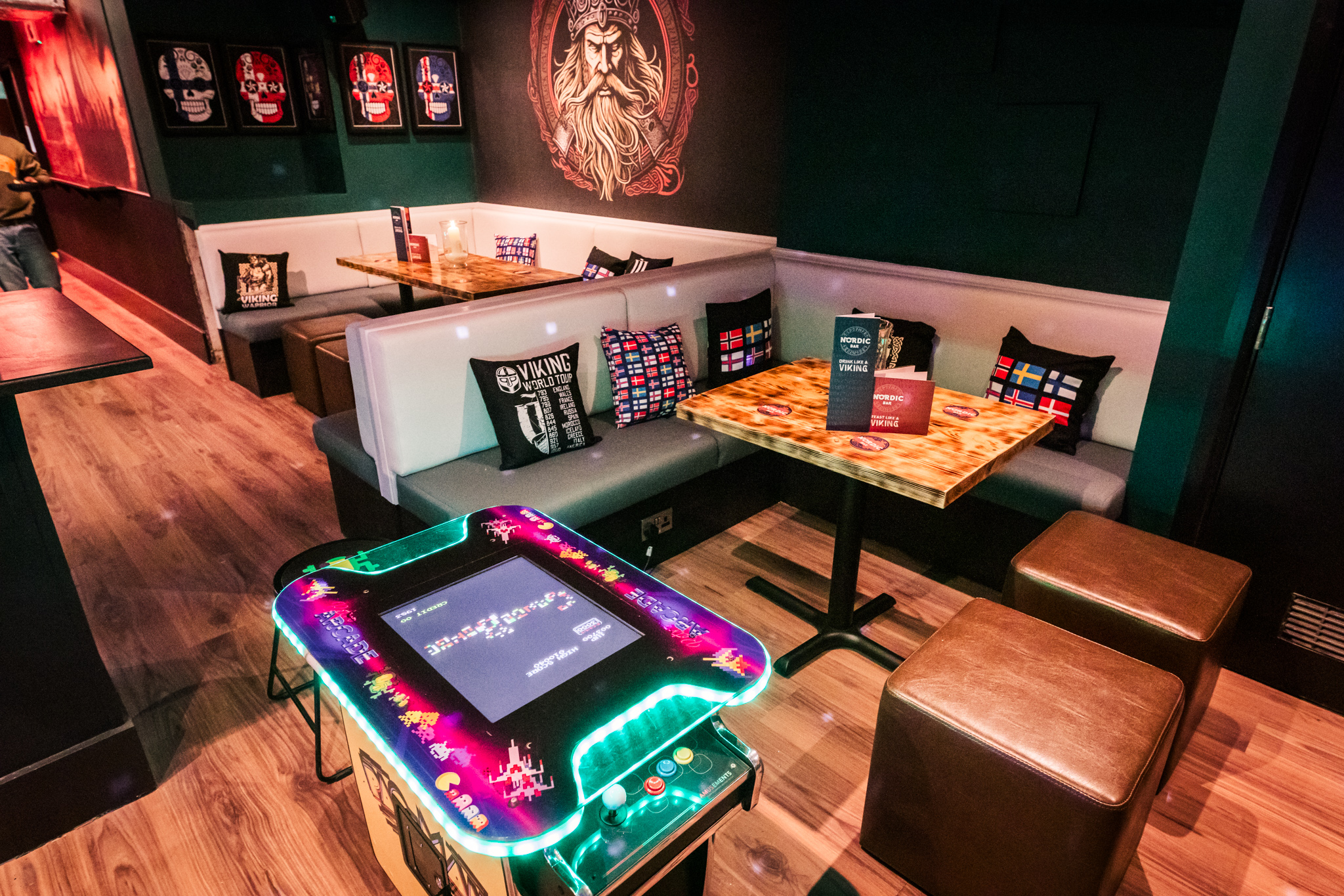 Vibrant Nordic Bar games room with cozy seating for social events and team-building activities.