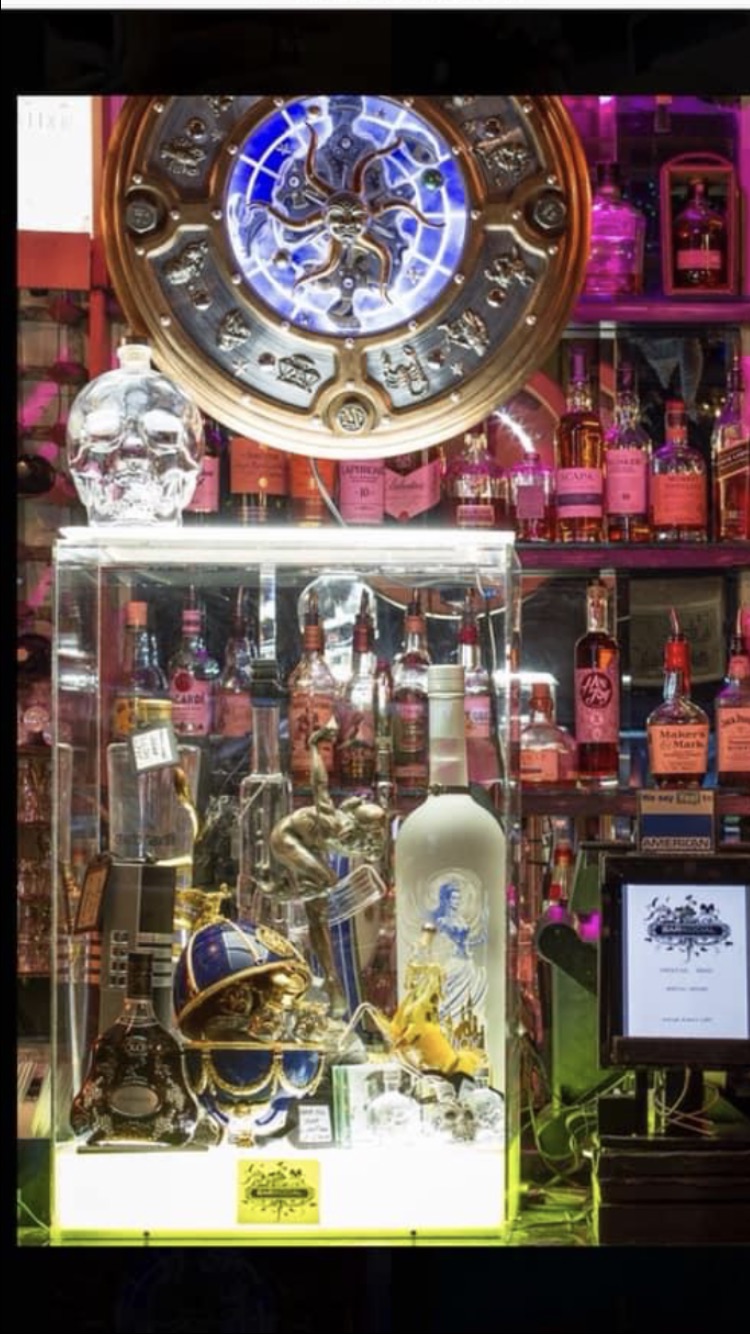 Whole Venue at Bar Social with colorful spirits, ideal for networking events and celebrations.