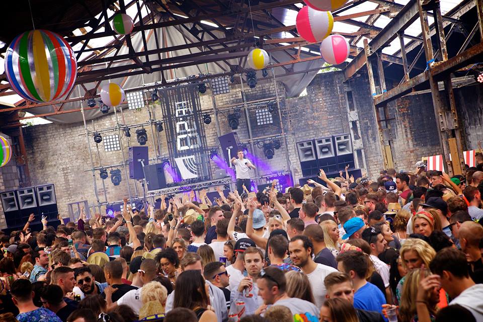 Vibrant crowd at The Roof Garden, ideal for music festivals and corporate parties.