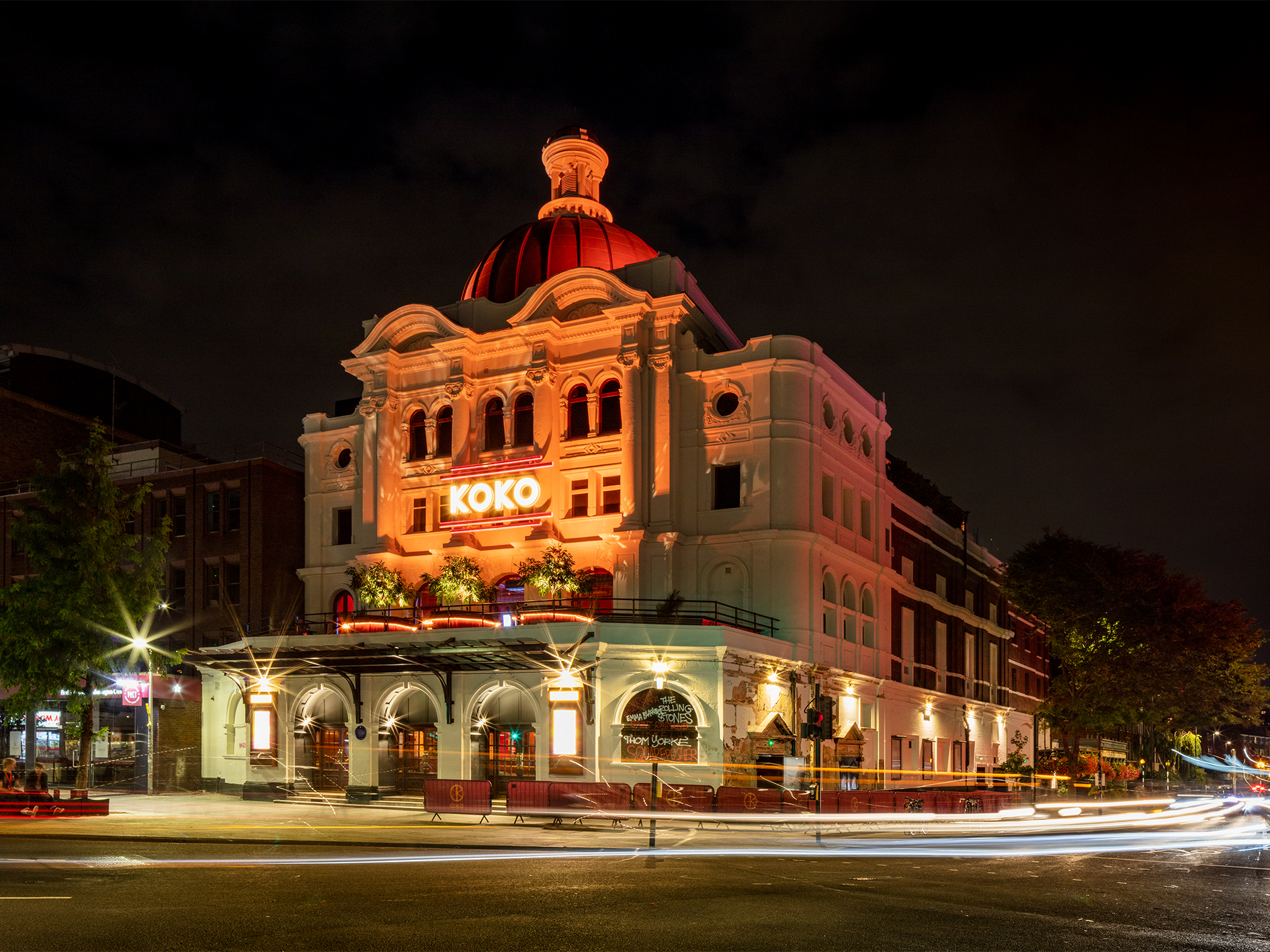 Illuminated KOKO venue, perfect for events, featuring unique architecture and vibrant lighting.