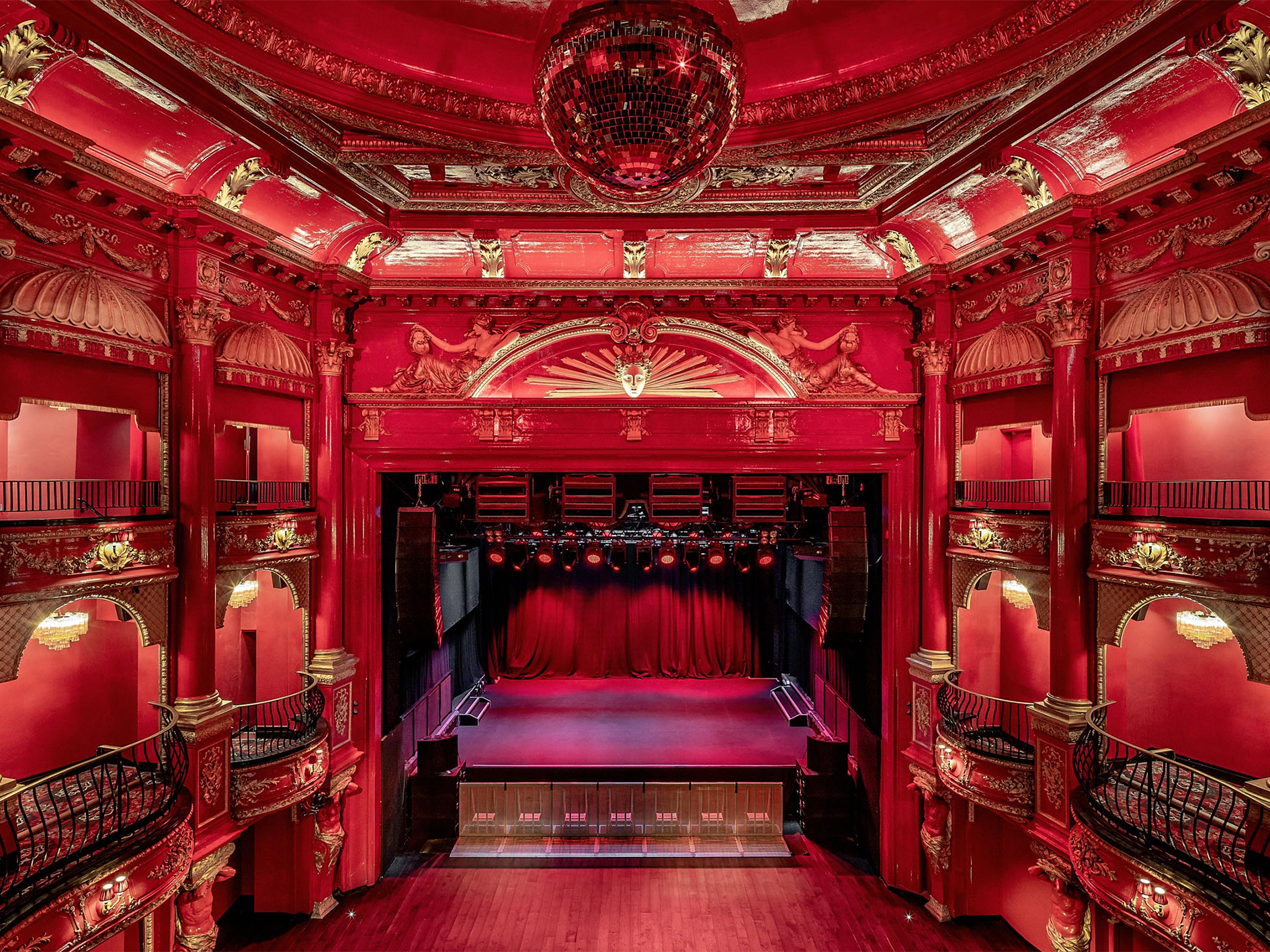 Stunning KOKO theater venue with red decor, ideal for conferences and live events.