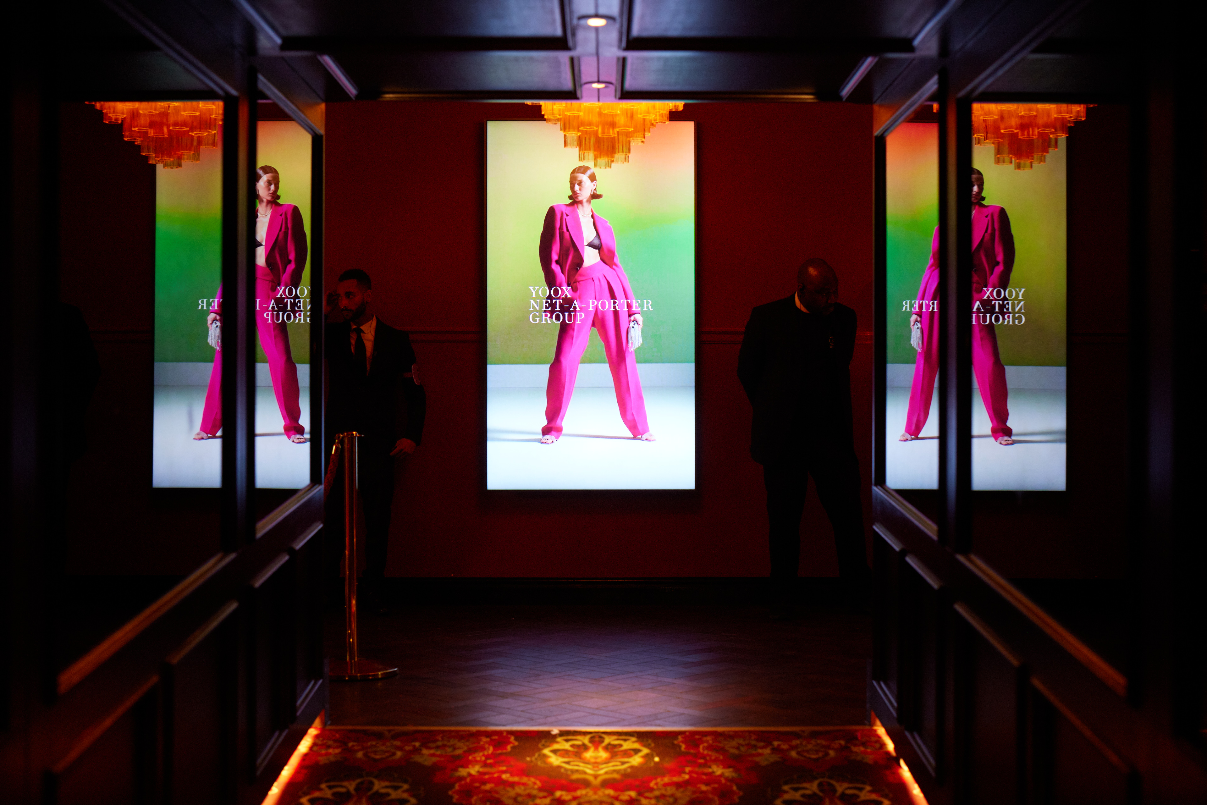 Upscale KOKO venue entrance with vibrant displays for exclusive events and networking.